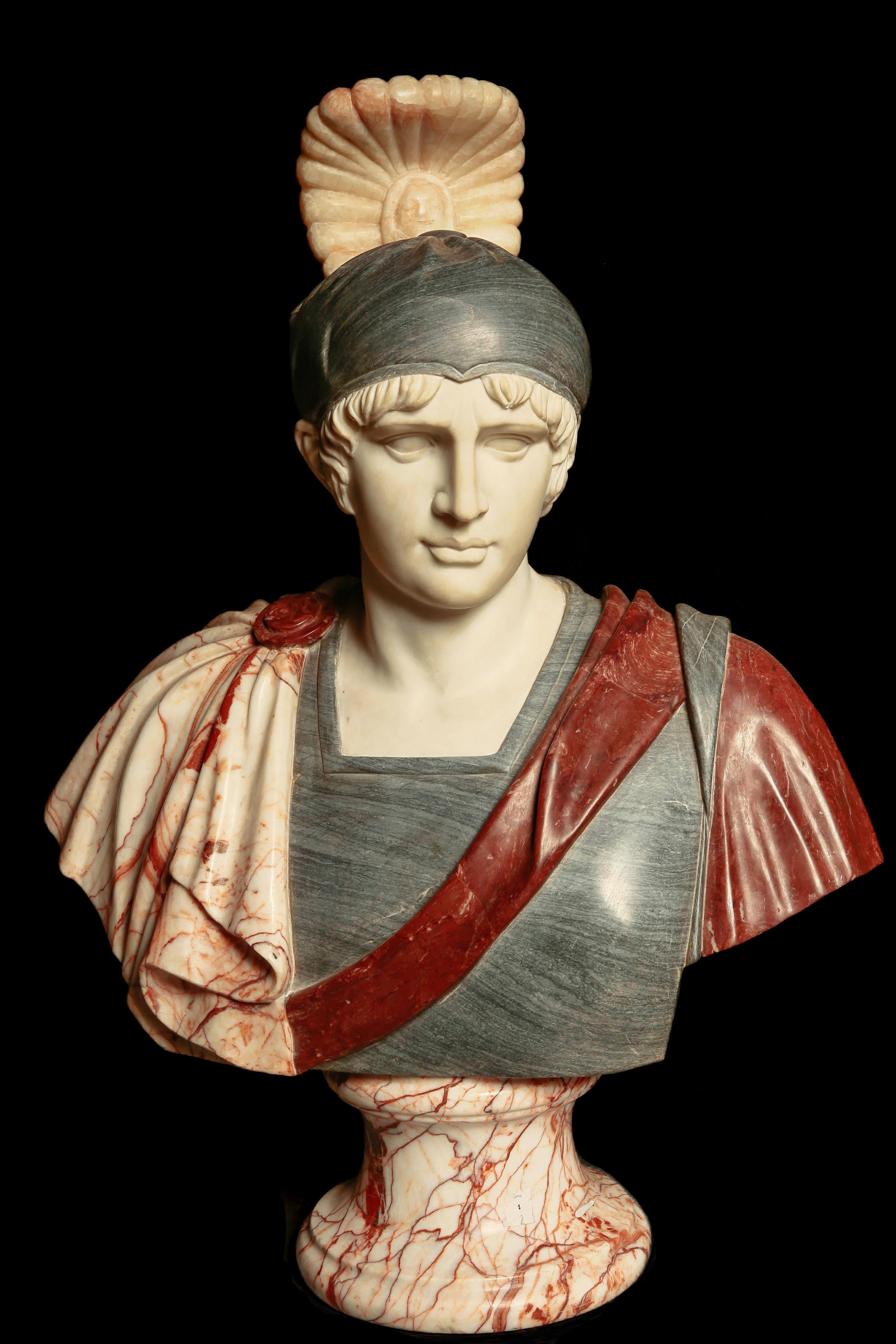 A large and unusual 19th century hand-carved Roman bust representing Achilles, executed in polychrome specimen marbles. The figure is shown wearing a crested helmet and classical military attire, identifiable by the warrior's youthful features and
