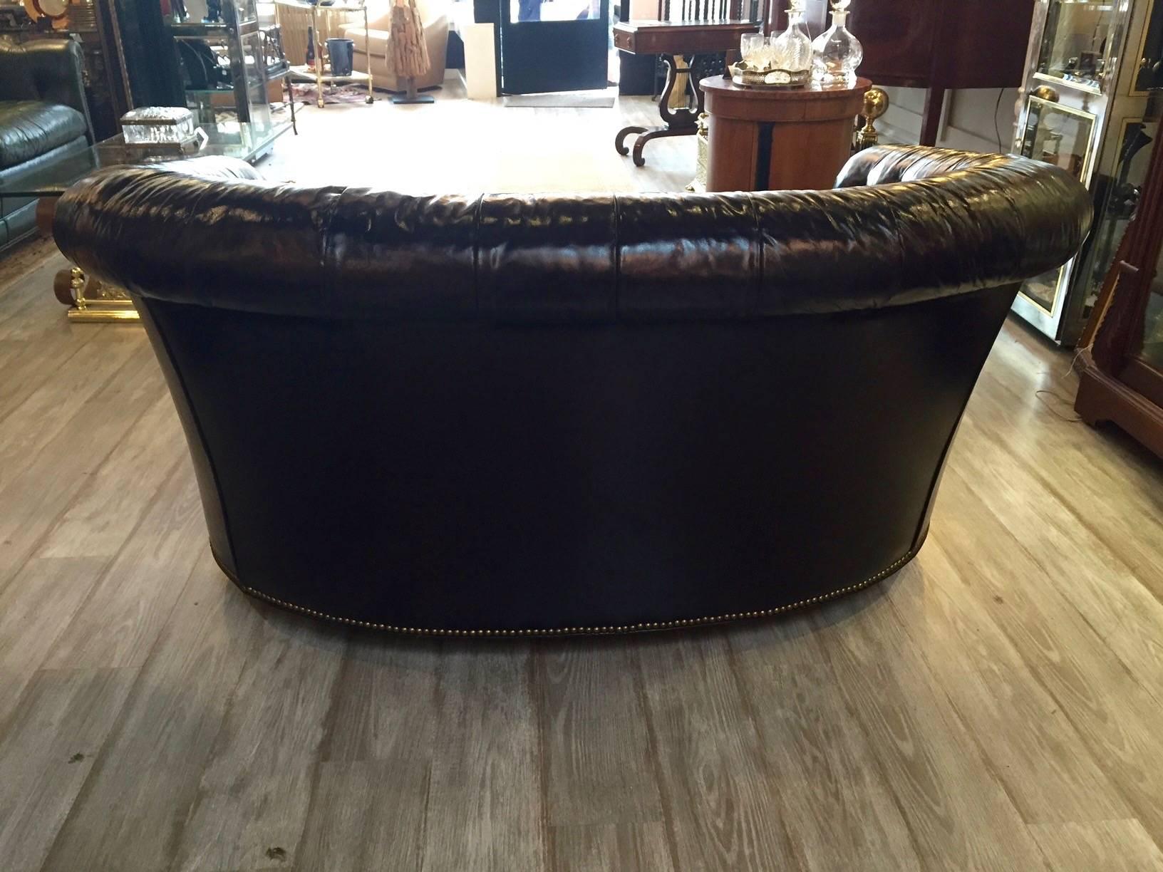 curved leather loveseat