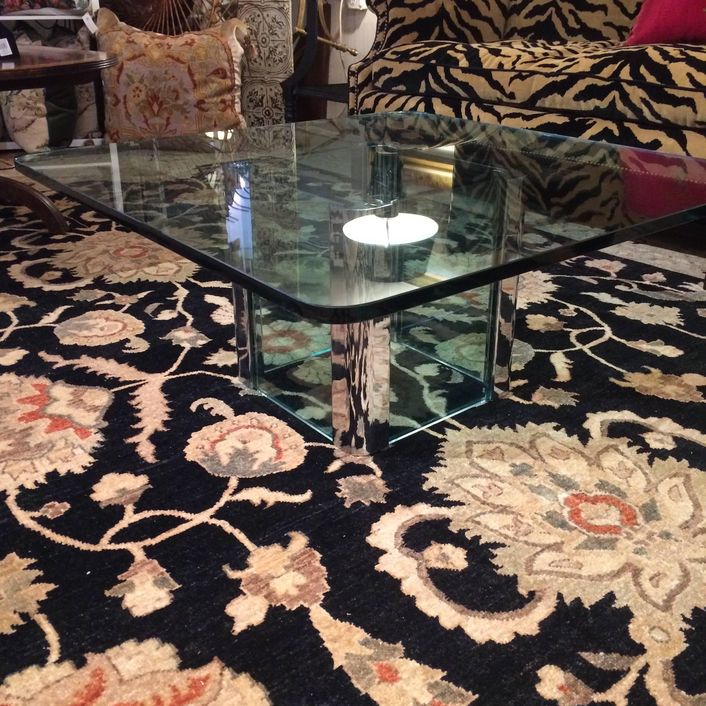 Classic Midcentury coffee table by Pace with open ended cube base of heavy glass and chrome, topped with a 1/2