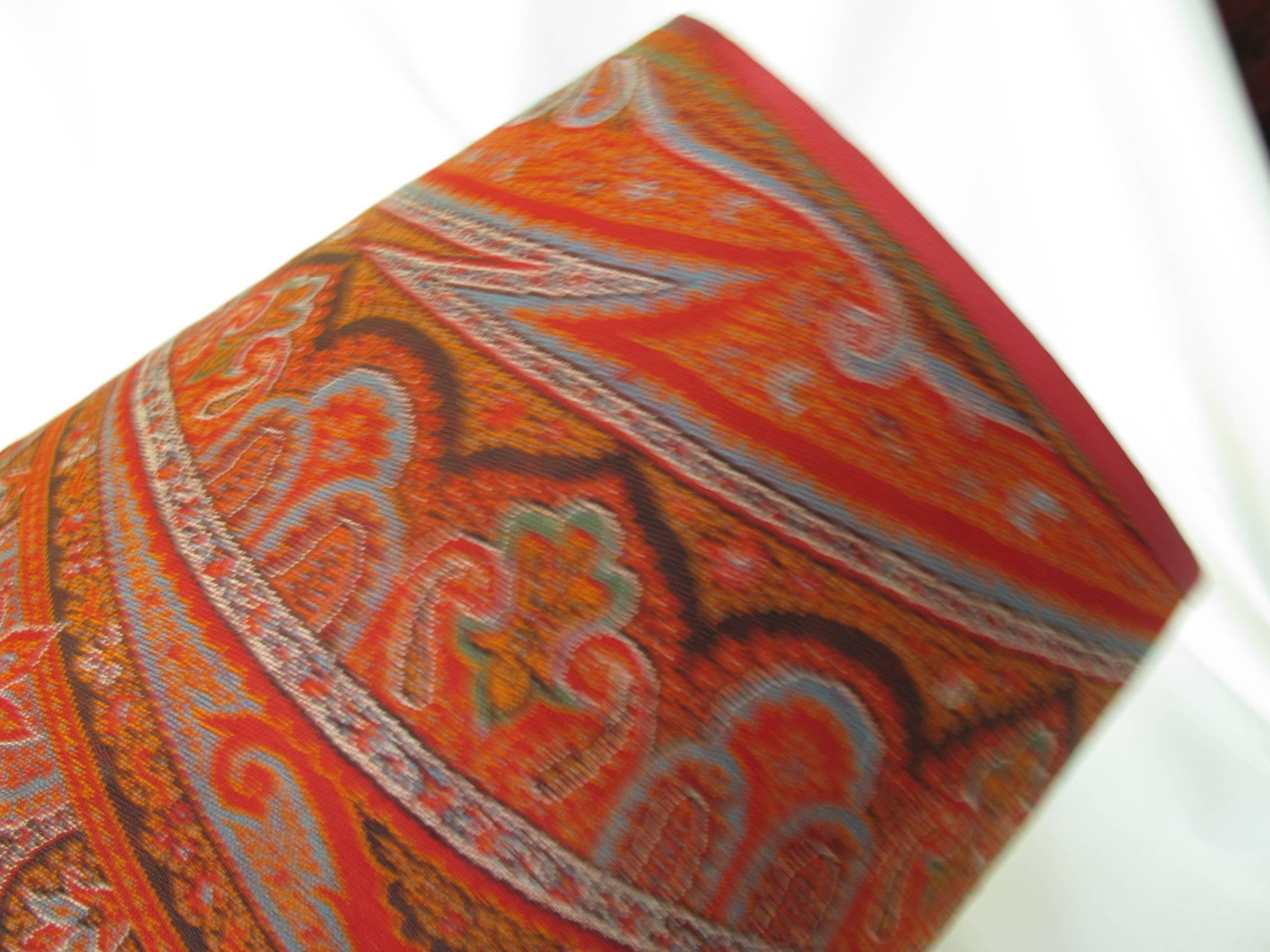 
A pair of lampshades handmade from a circa 1860s Scottish wool hand-loomed paisley shawl. With warm shades of red, orange and a touch of blue.
Measures: Top 9