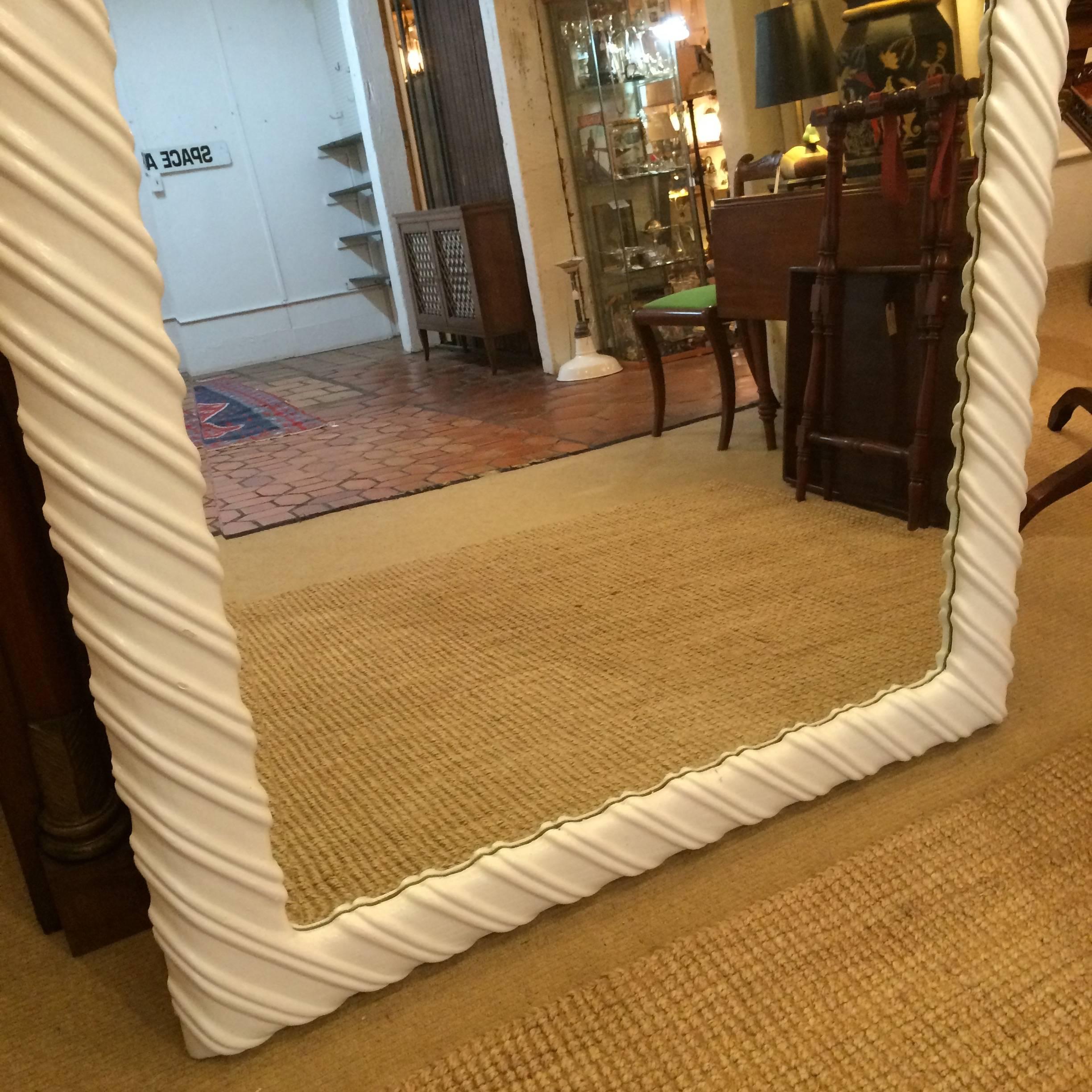 Fabulous large bevelled mirror with a chunky white frame having raised diagonal stripes to give it a graphic contemporary look.

GG