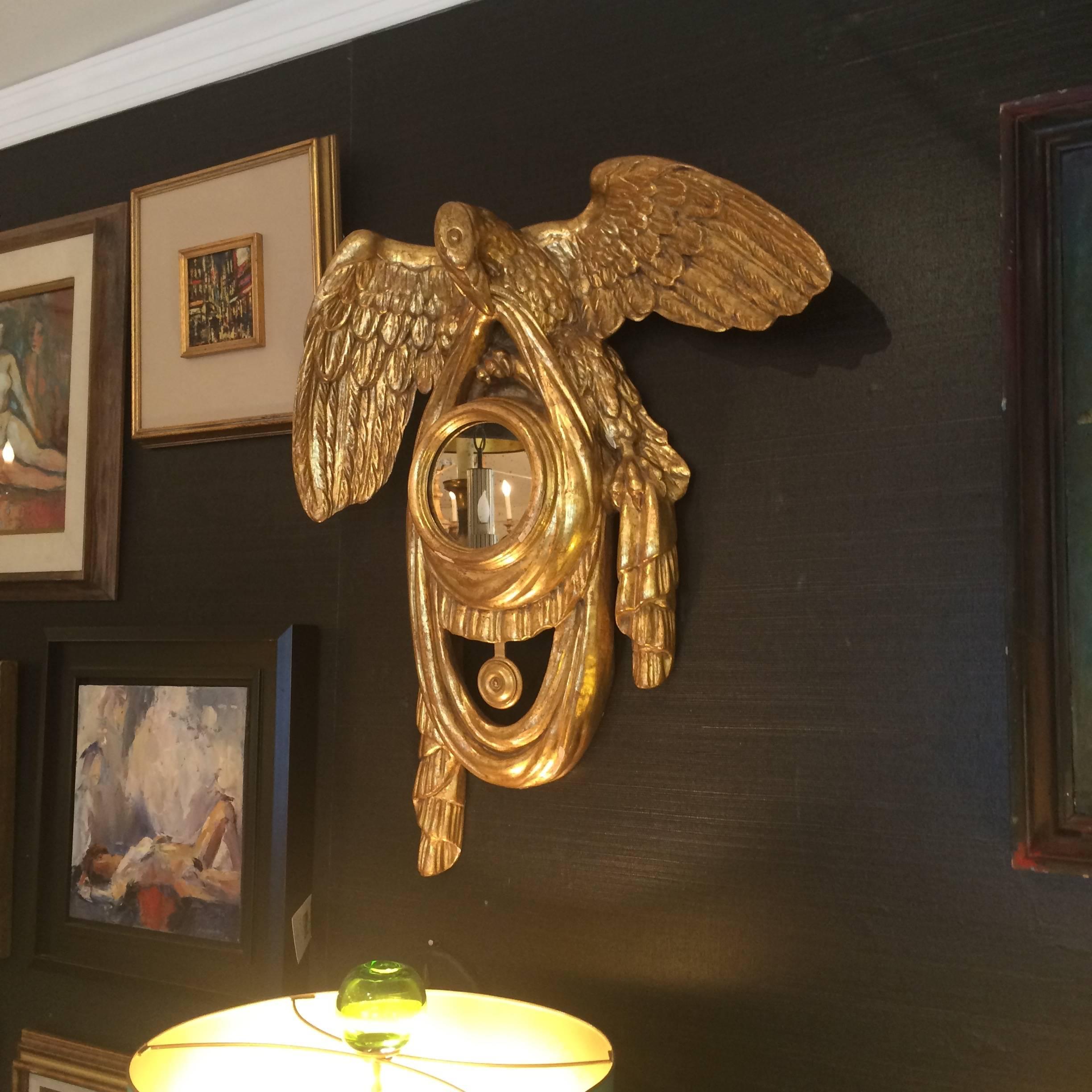 Eye-catching gold leaf mirror having a central 5