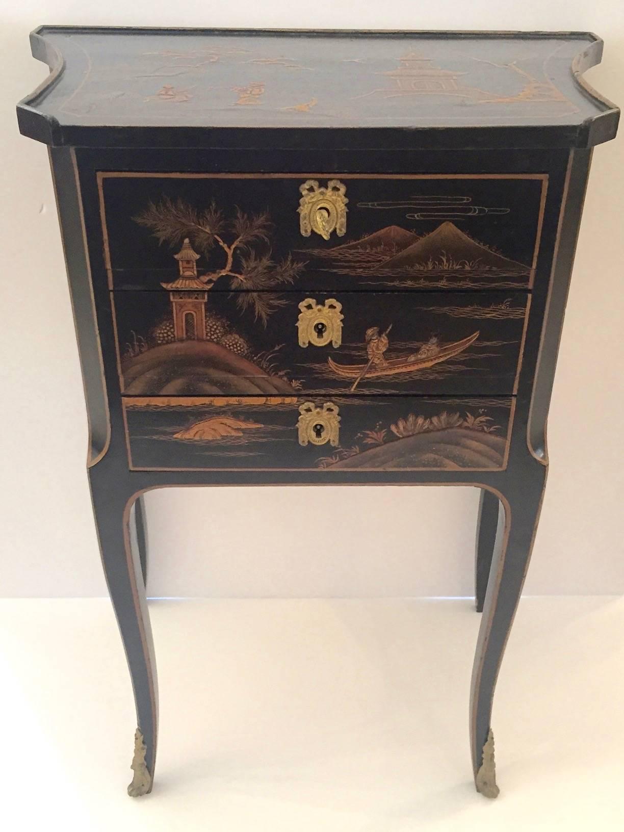 Fine Louis XVI French hand-painted chinoiserie nightstand/ side table/ small chest of drawers. Gorgeous ormolu keyholes and one key, sabre legs with bronze caps, refined workmanship including dovetailed drawers, painted back side, and meticulous