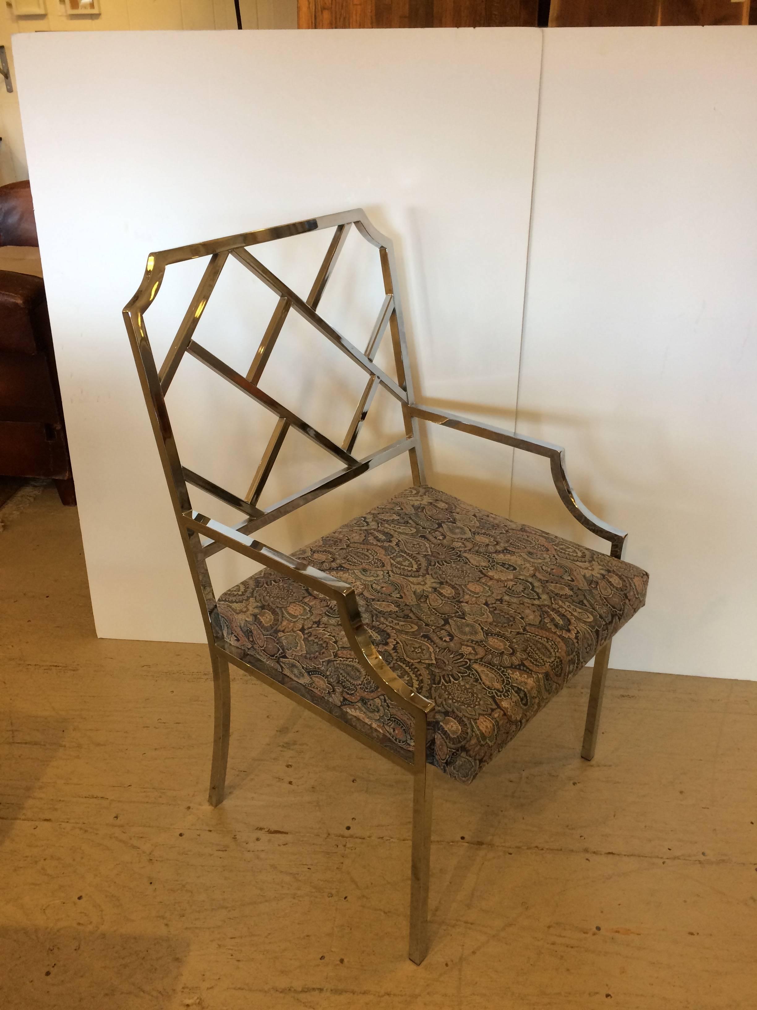 Sleek set of Mid-Century Modern chrome Chippendale inspired armchairs designed for Design Institute of America.
Great condition but seats should be updated with new fabric. 