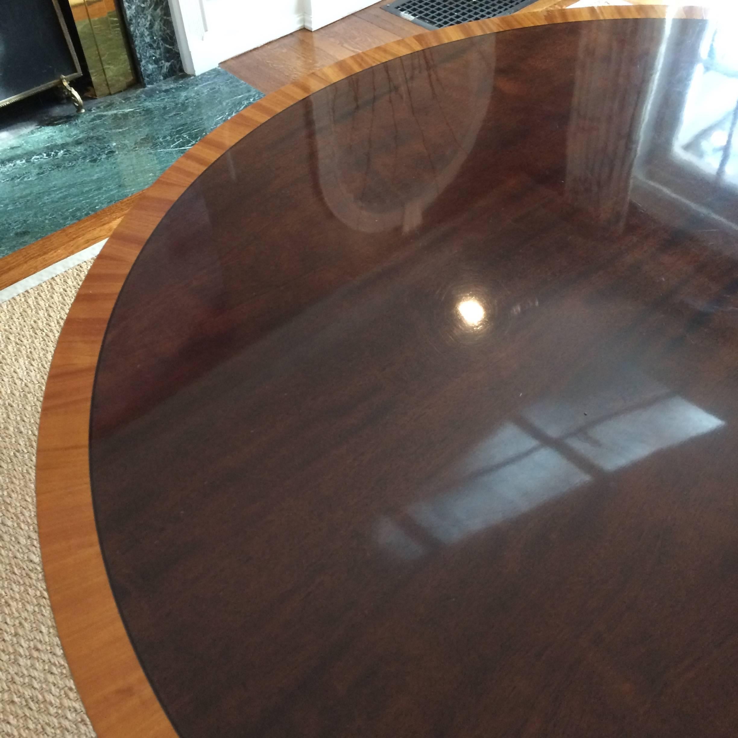 Refined elegance in a very versatile oval dining table with two leaves, (16
