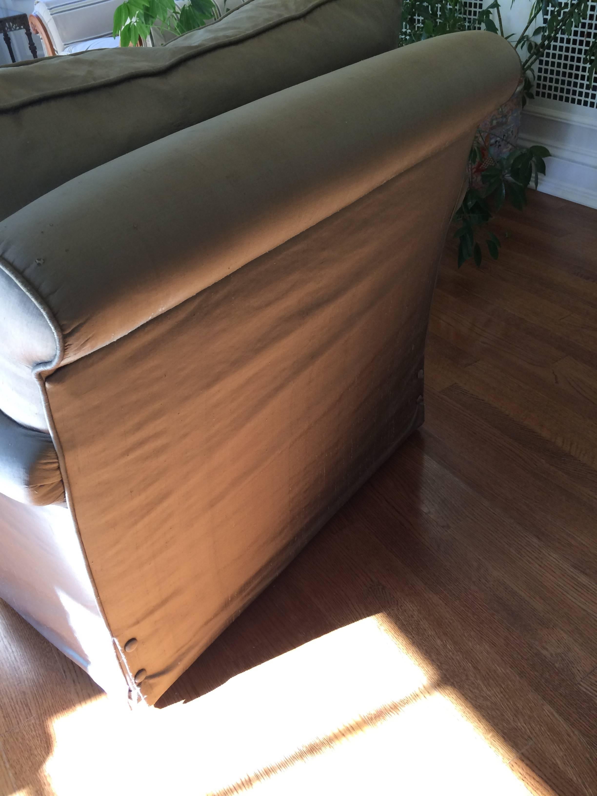 Classic large comfy yet elegant club chairs, down filled and upholstered in ca classy taupe silk with button detailing on the sides. Seat depth 23 in