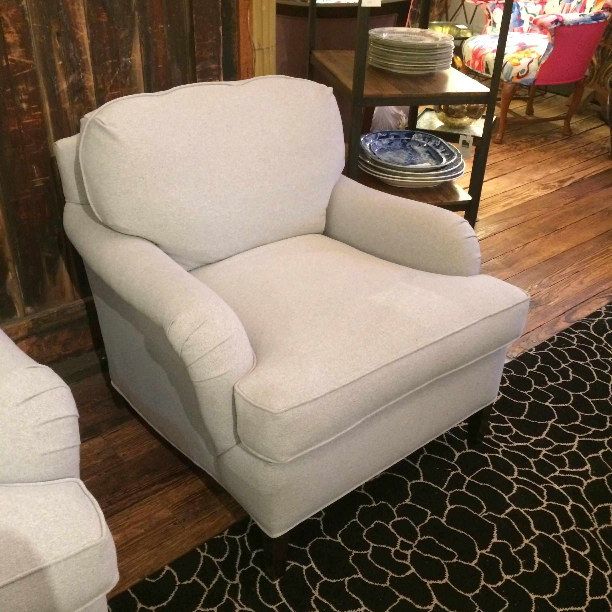 Wonderful vintage pair of Classic club chairs, newly redone in a light grey linen and comfy luxurious down. Seat width 28.5.