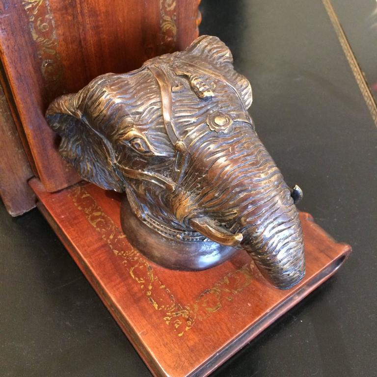 Masculine Leather and Bronze Elephant Motiffe Bookends at 1stDibs