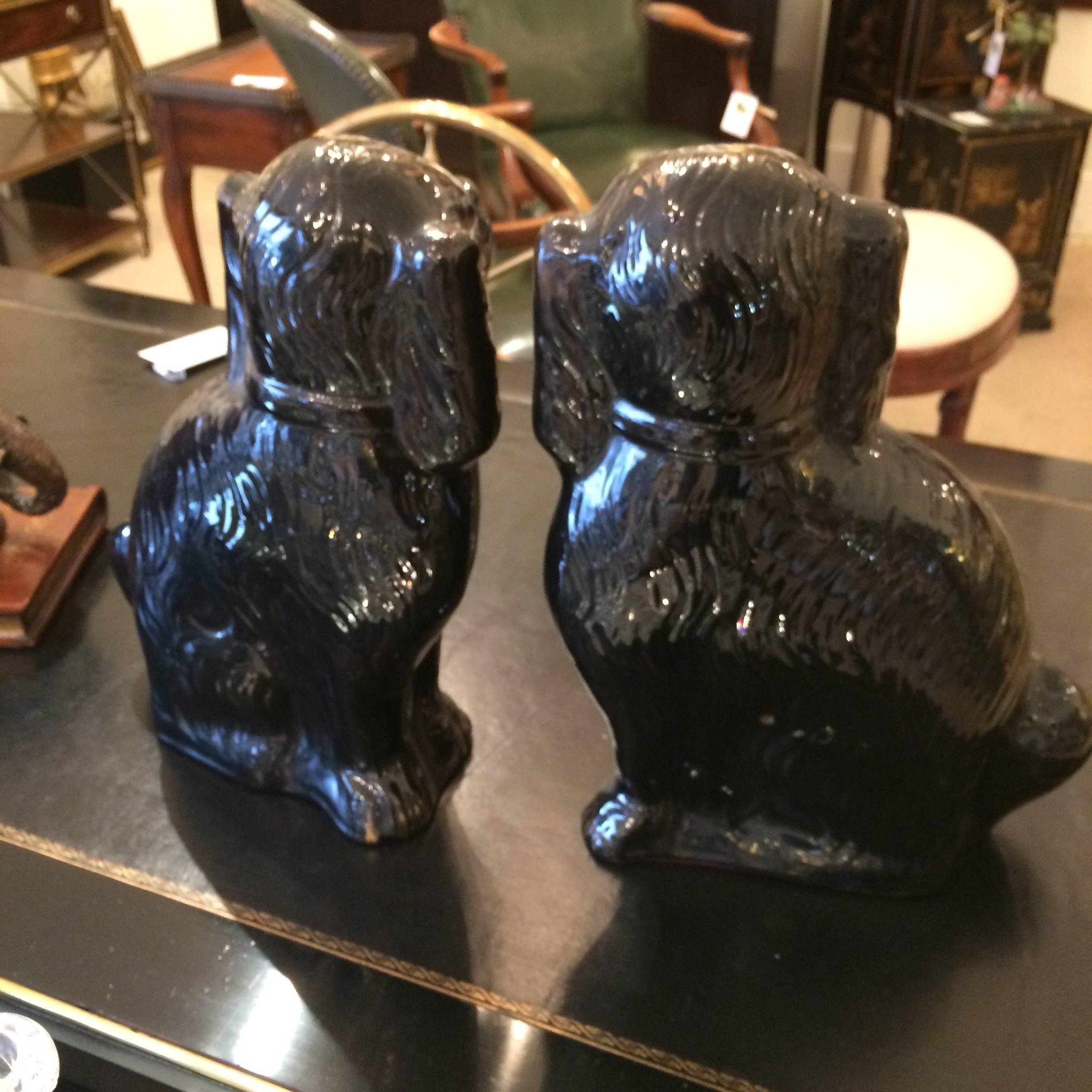 American Large Pair of Antique Black and Gold Staffordshire Spaniels