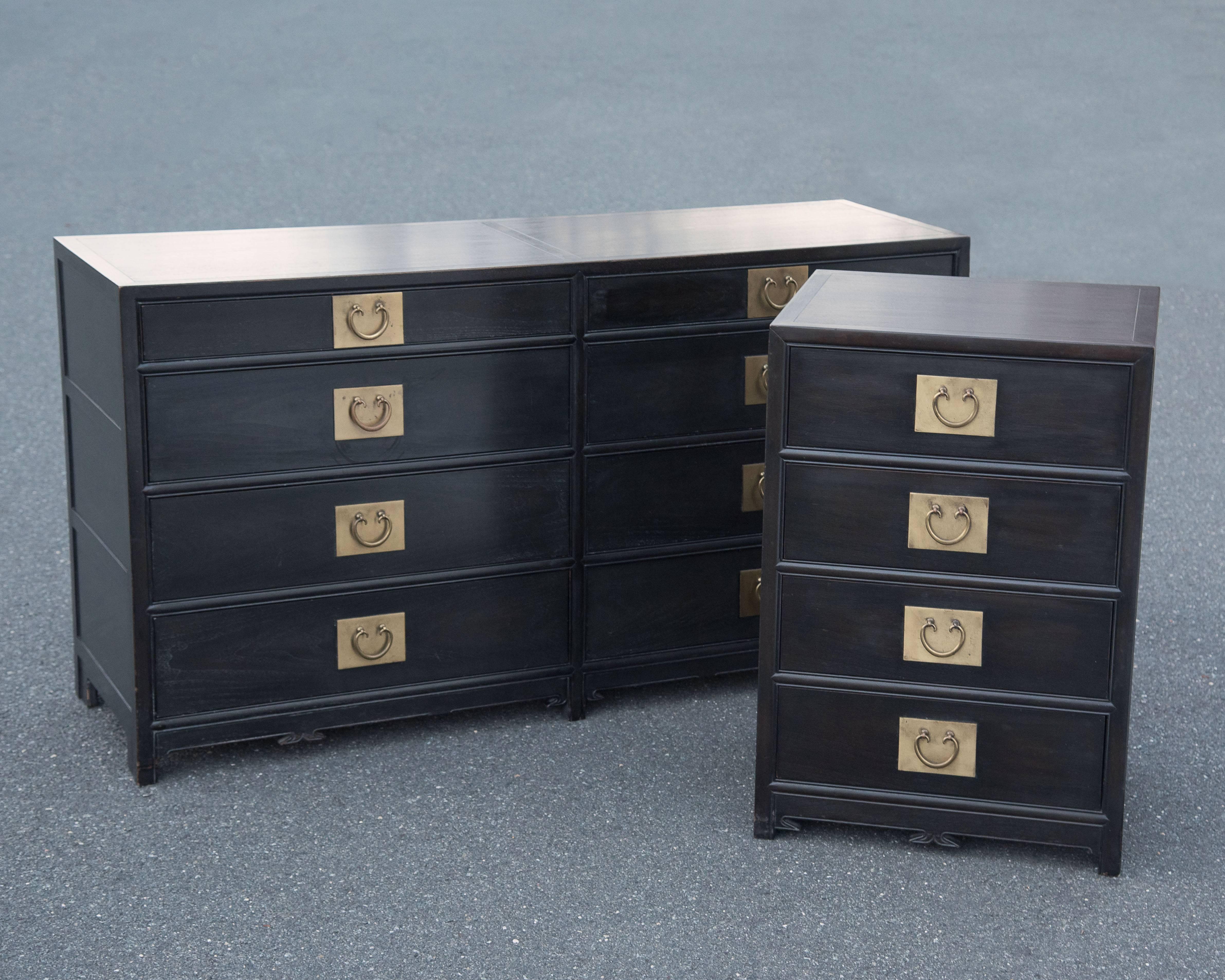 A beautiful eight-drawer dresser by Michael Taylor for Baker with handsome Dorothy Draper style brass hardware, not original to the pieces. Retains label from the maker on inside of drawer.   Large dresser is 60W 32 H 19 D
Matching smaller side