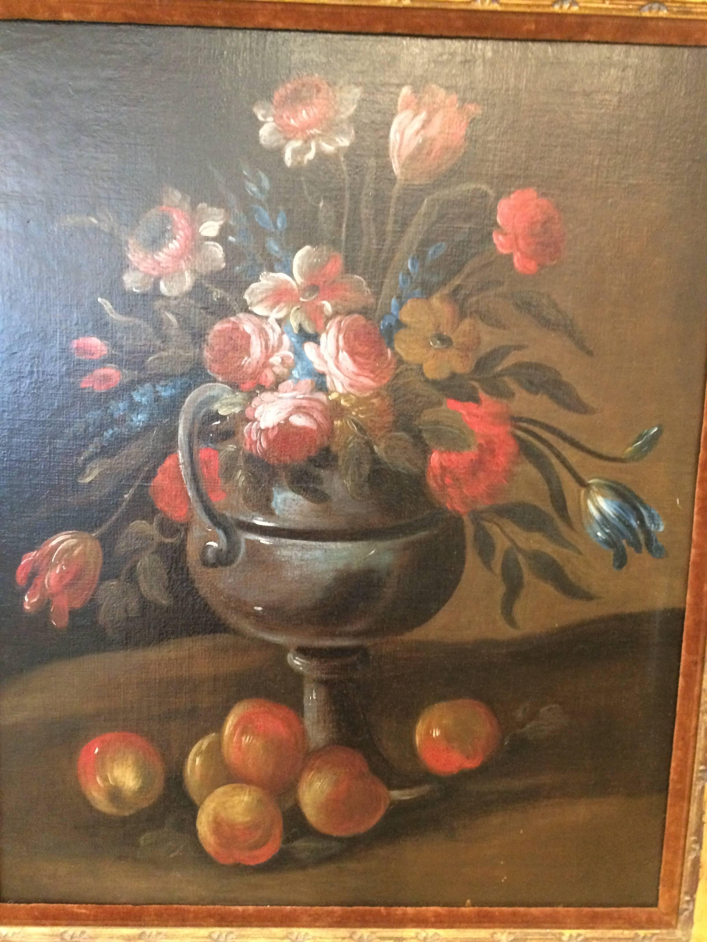 Impressive antique oil on canvas in muted tones against a dark background; subject is a beautiful floral arrangement with oranges around the base of the vase. Chunky giltwood antique frame. No signature.