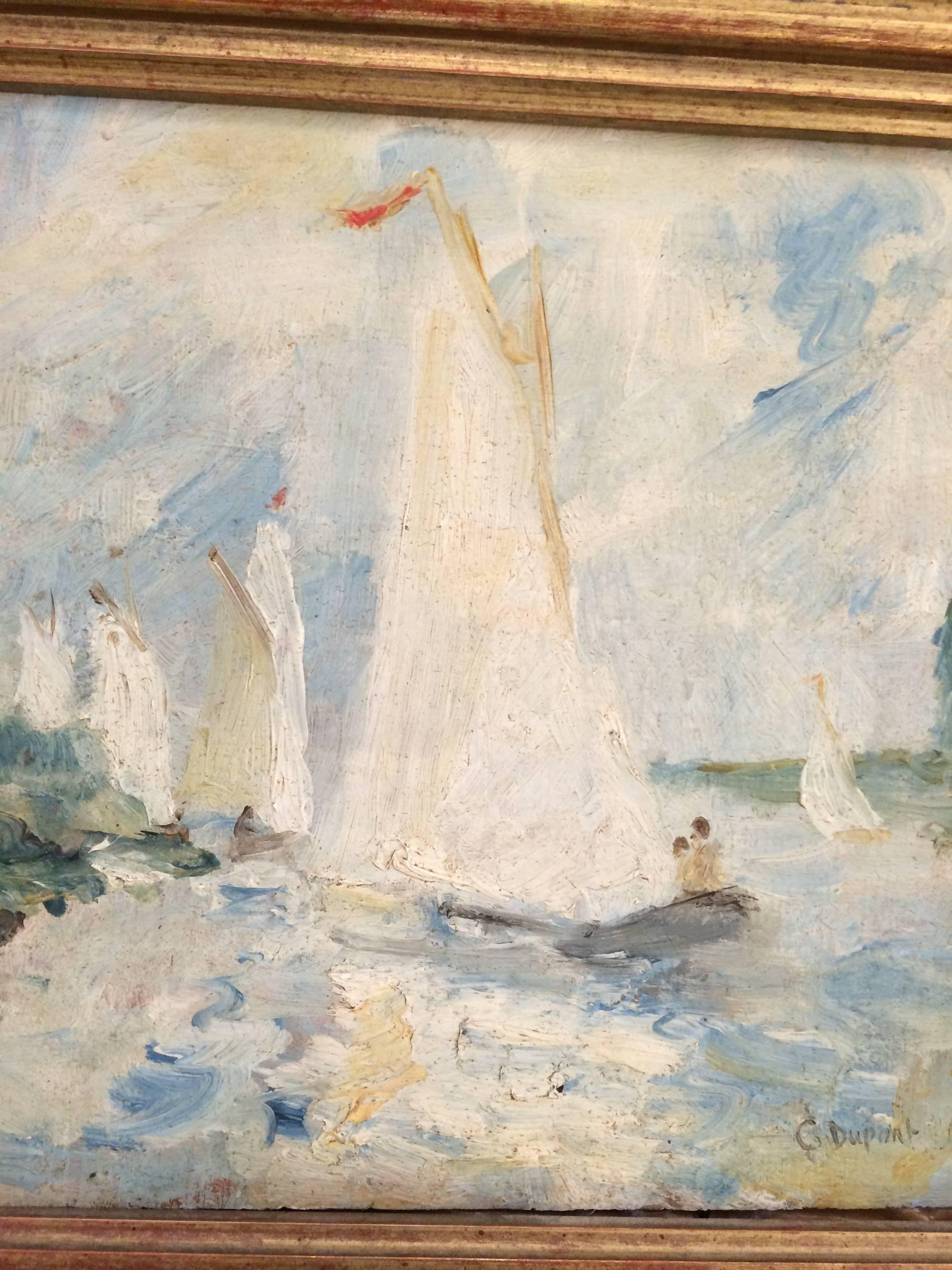 Soothing impressionist seascape with boats in subtle pastel colors, oil on wood board, signed by listed American painter G. Dupont. Framed in a giltwood moulding that harmonizes with the colors in the painting.