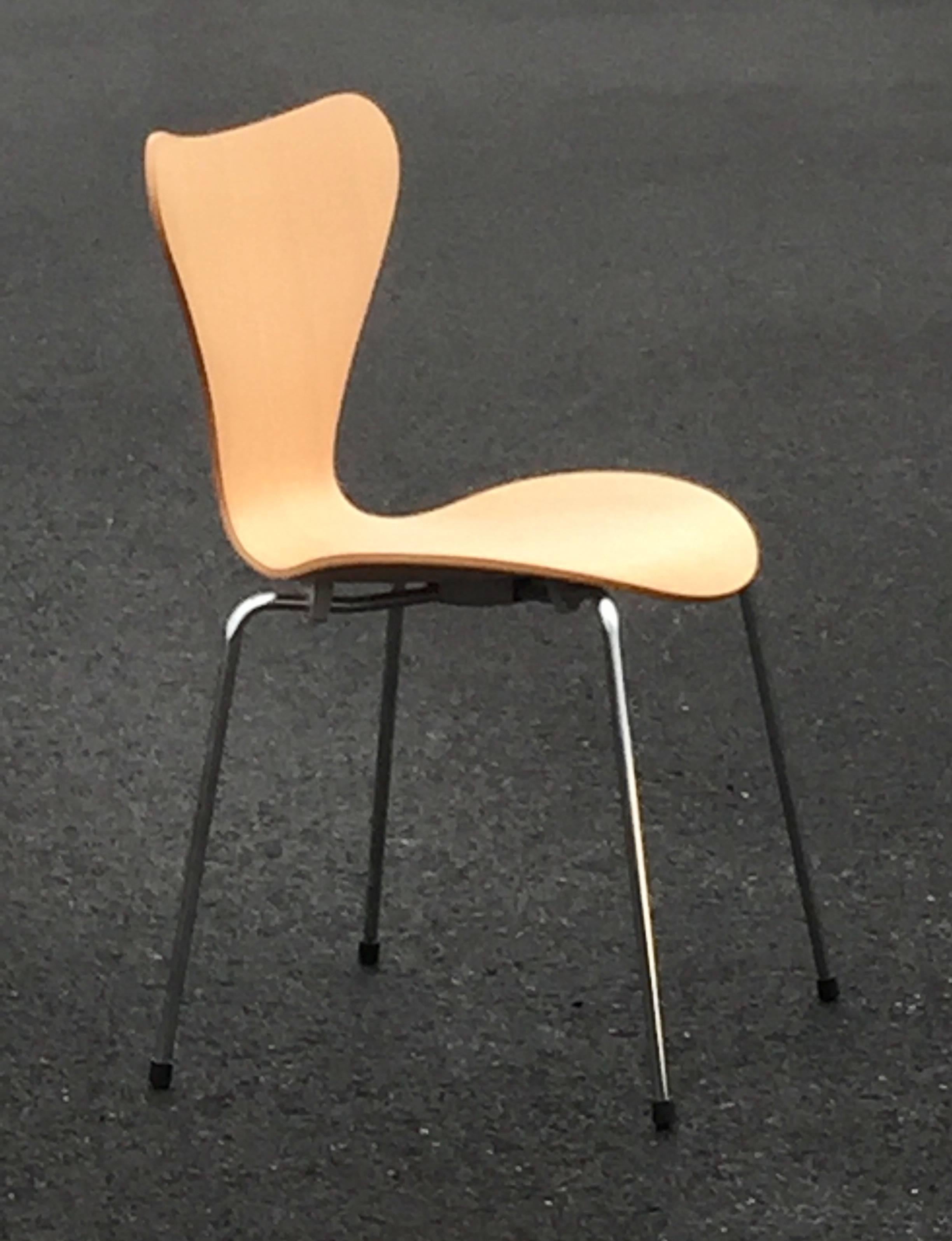 Iconic Arne Jacobsen design, natural finish, Mid-Century Modern stackable dining or conference room chairs with chrome legs.  Three are ash molded seats, one is oak. Label underside.
Will sell individually for $375/chair.
Measures: Seat height: 17