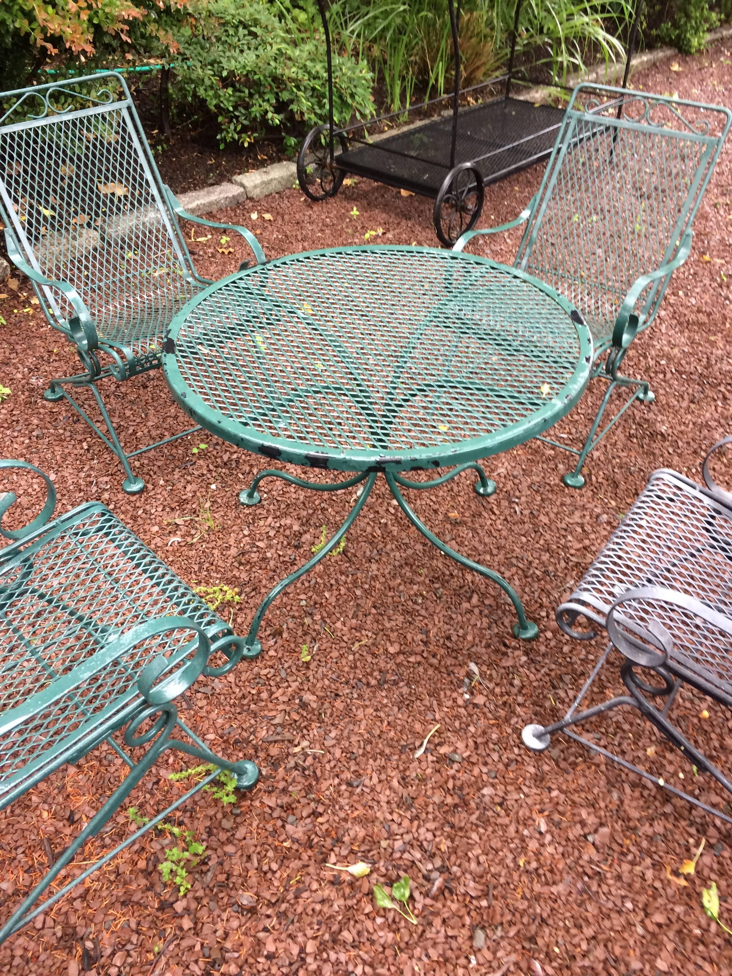 Adorable outdoor dining set by Woodard, pint sized for the kids at the party. 
 Chairs are 15 W, 16 D, 23.75 H seat height 11.5
Table is 24.5 diameter.