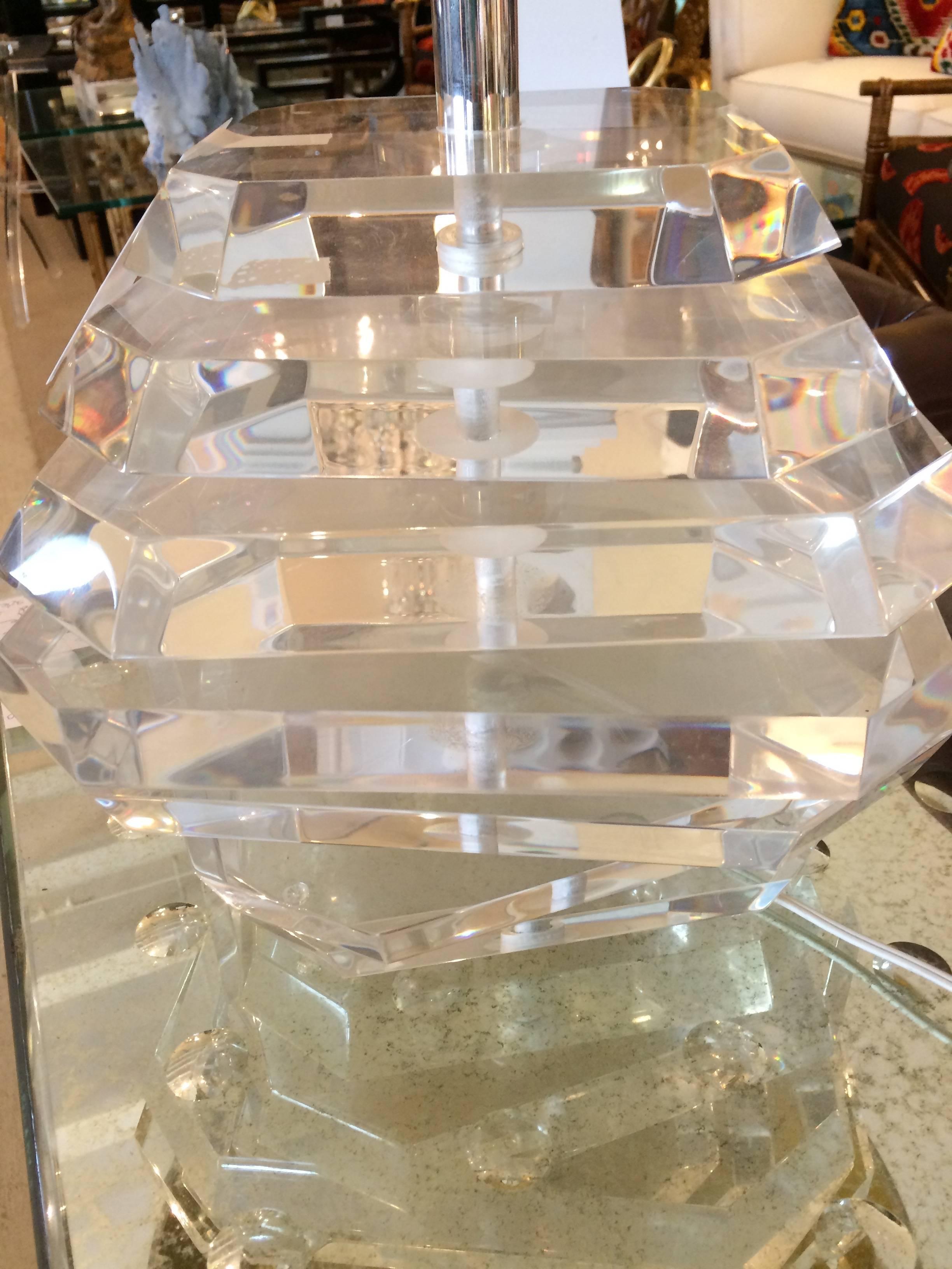 Sculptural Mid-Century Lucite lamp with custom shade. Each horizontal piece is moveable. Lucite finial. 
Base with moving parts is 13 x 13.