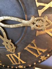 Striking Iron and Gold Clock Face Sculpture