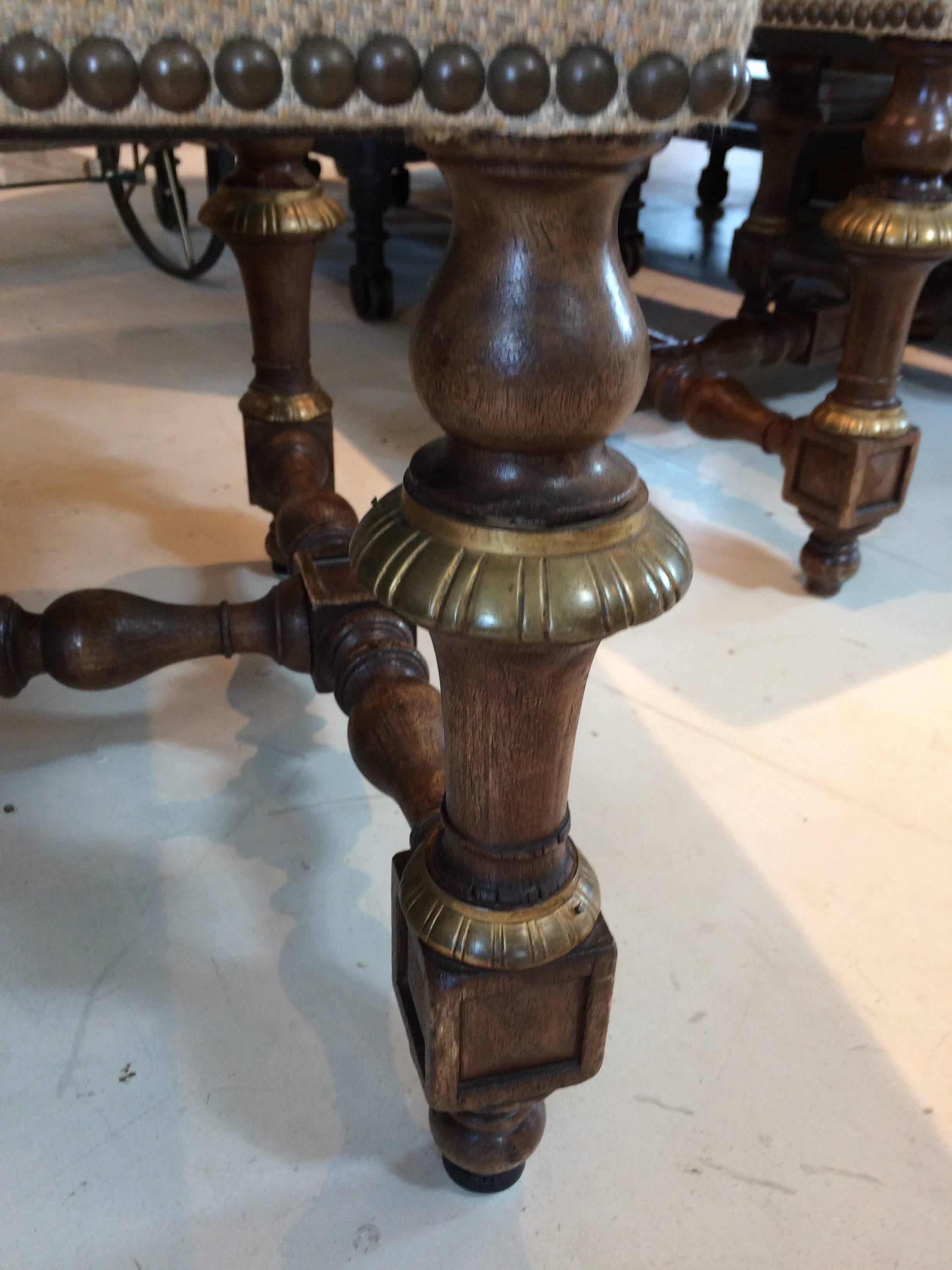 Regal Set of Eight Early French Carved Walnut and Bronze Gilded Dining Chairs In Excellent Condition In Hopewell, NJ