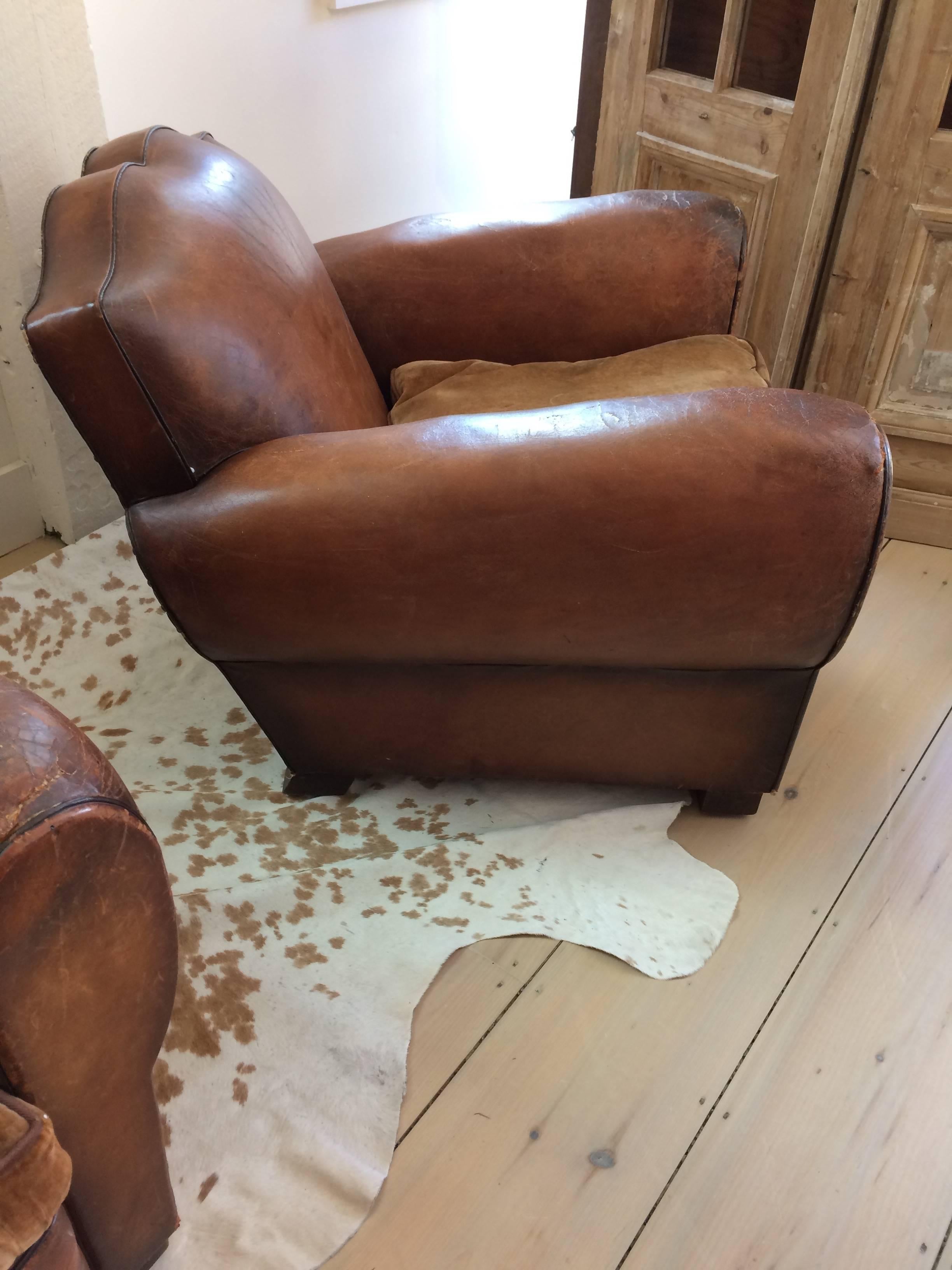 Authentic Pair of Distressed French Vintage Moustache Style Leather Club Chairs 1