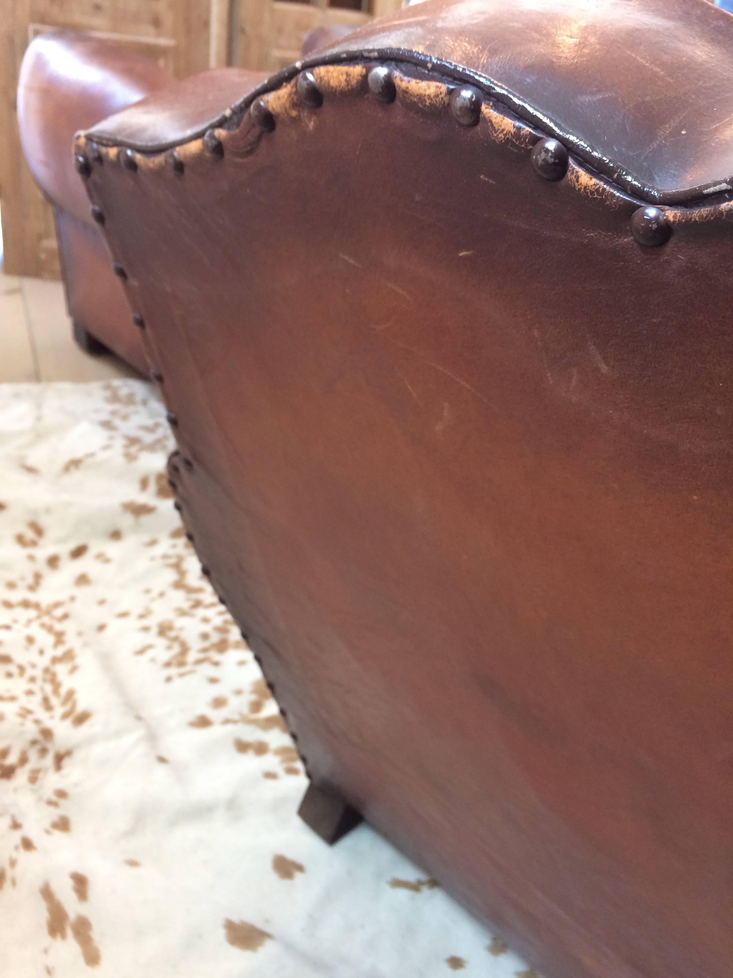 Authentic Pair of Distressed French Vintage Moustache Style Leather Club Chairs 3