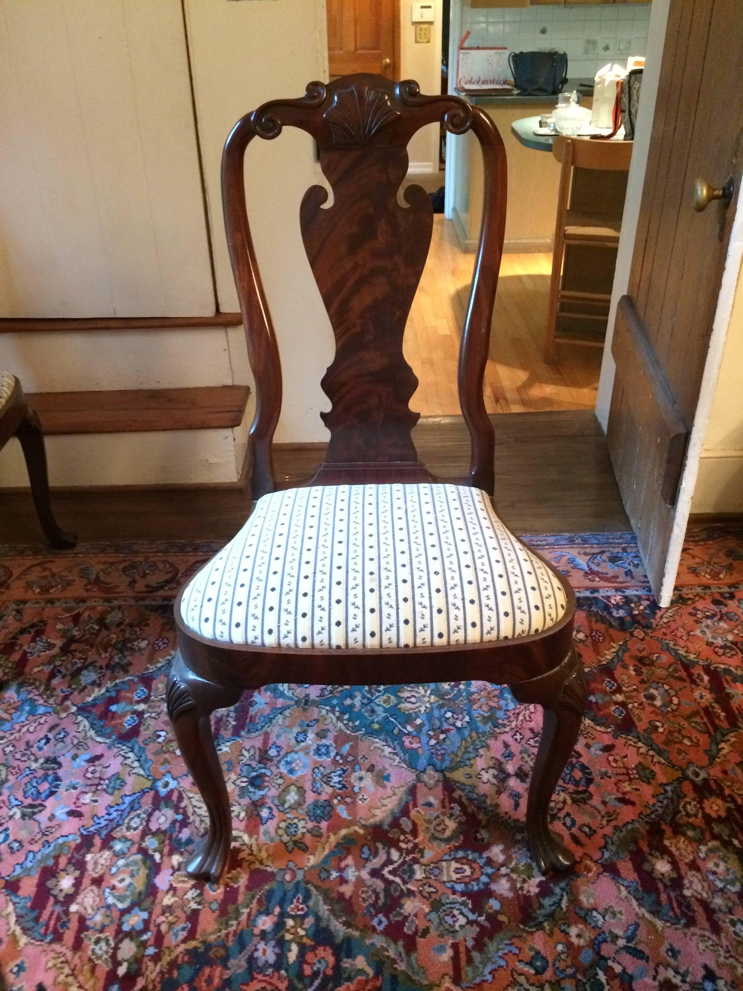 Beautiful carved mahogany dining chairs by Council Furniture having two armchairs and six side chairs, a pretty scallop shell decoration at the top and recently Scalamandre fabric covered seats.
Sidechairs 24.5 W, 42.25 H, 33 D, 19.5 S/H.