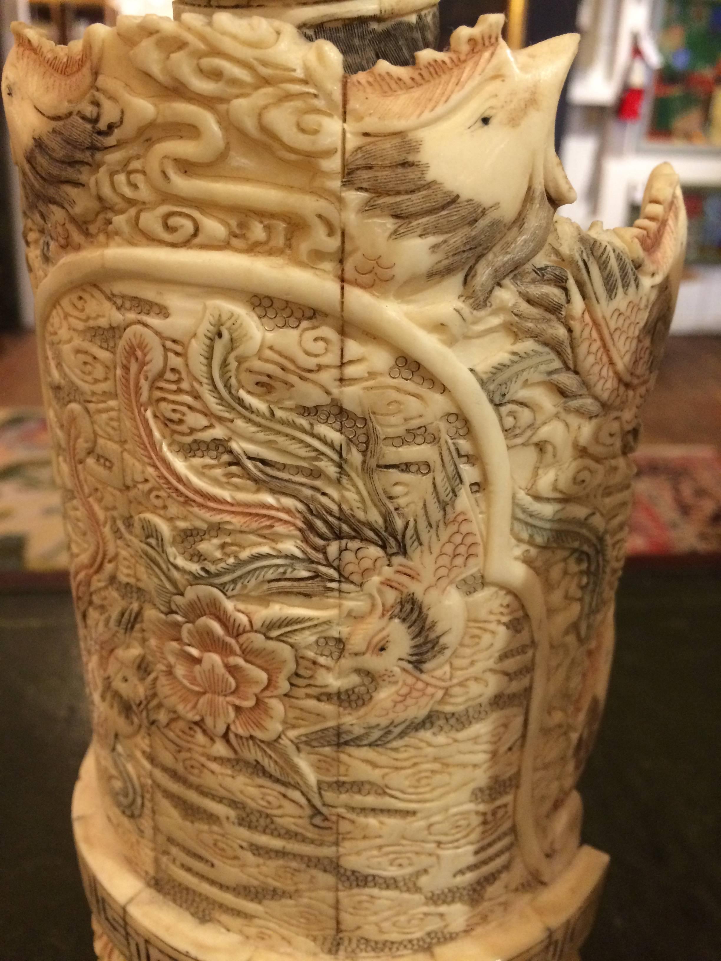 Meticulously carved pair of ancestral Chinese figures, a man and a woman, with stamp on bottom.