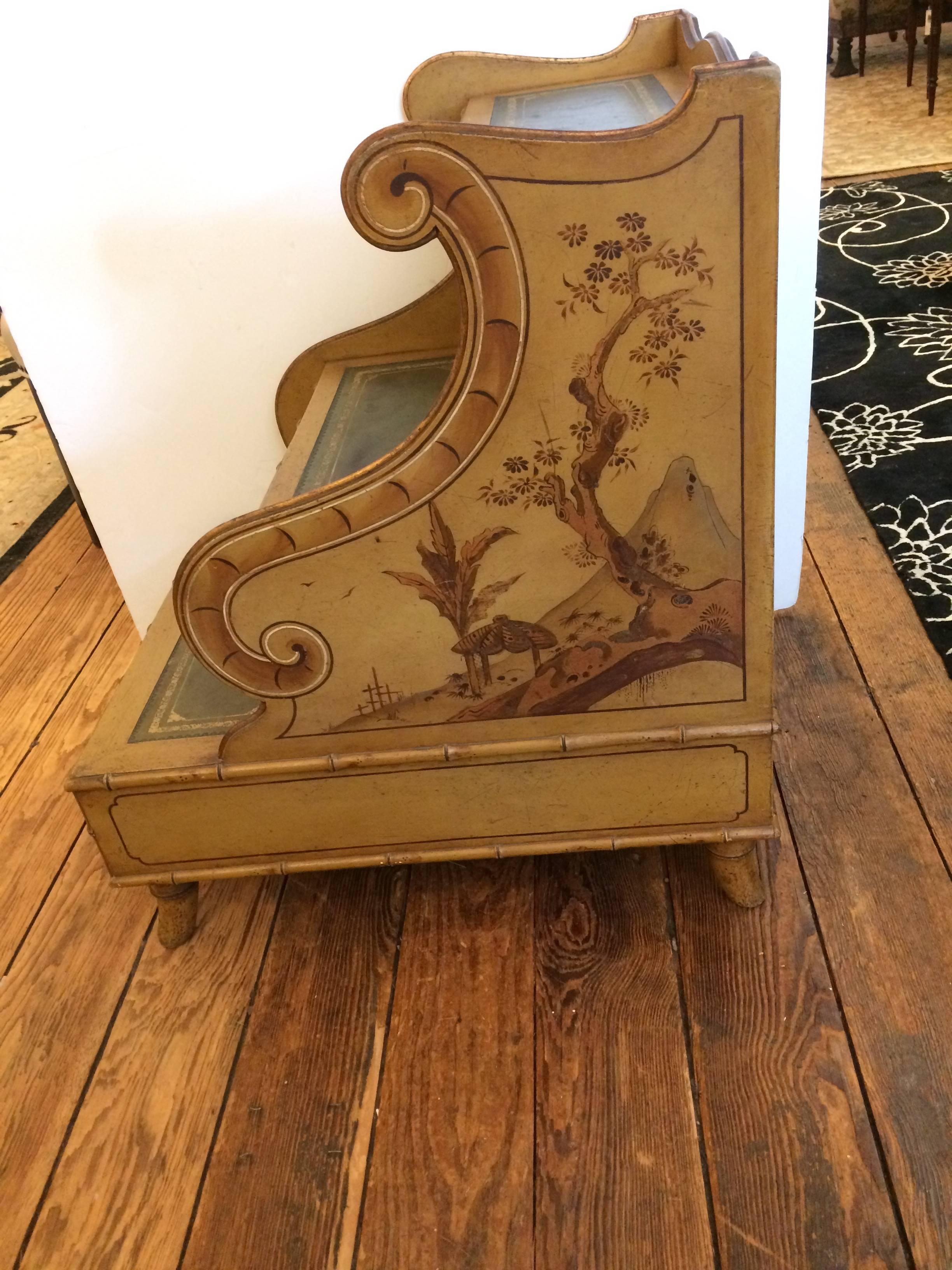 Vintage and rare beautiful library steps having hand-painted Asian style decoration with birds and foliage in a gold yellow oxide color and raw umber, with olive green tooled leather steps and two working drawers. Gorgeous from every angle so