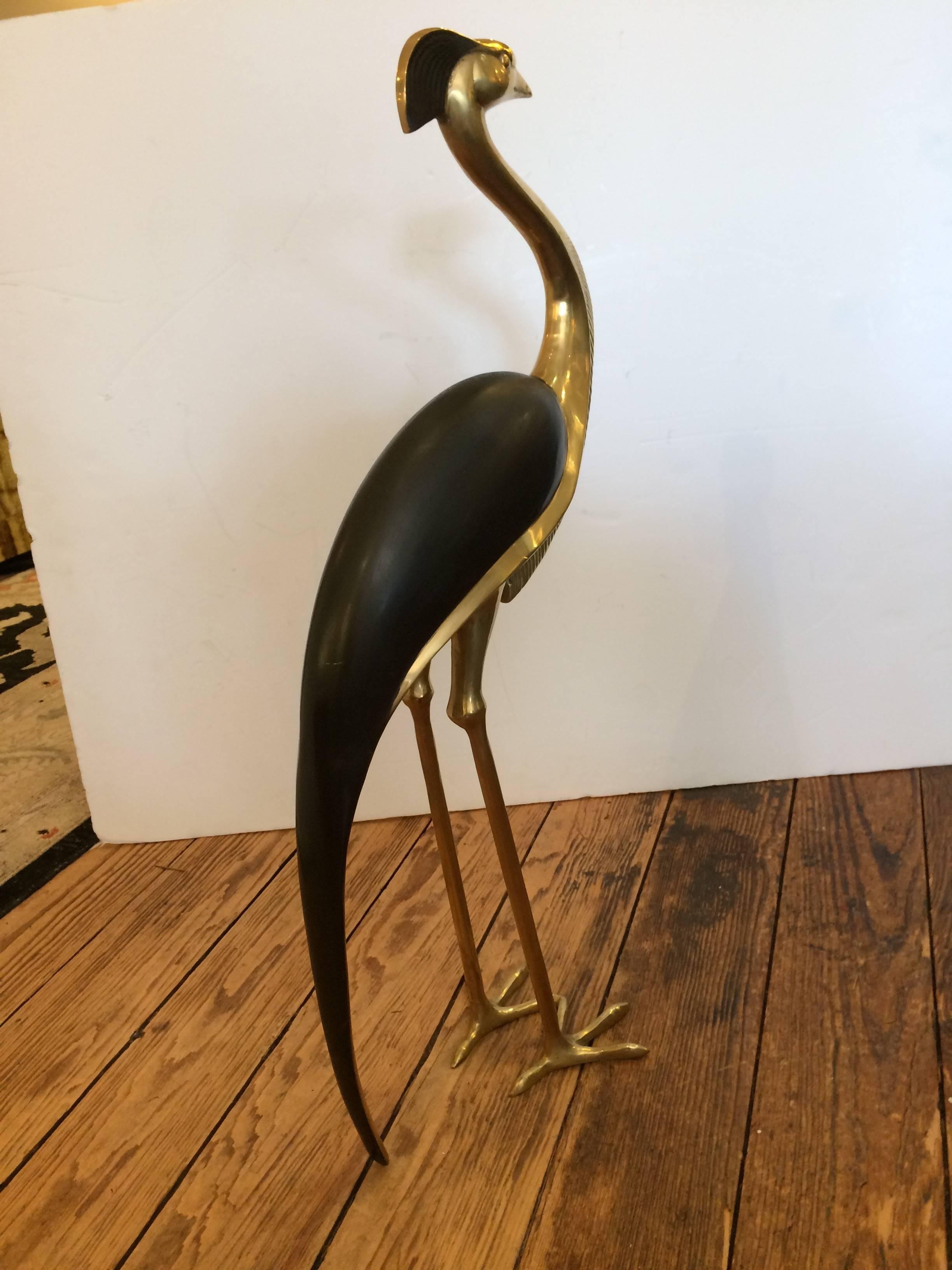 Eye catching very dramatic objet d'art, a brass and bronze stylized sculpture of a crane.