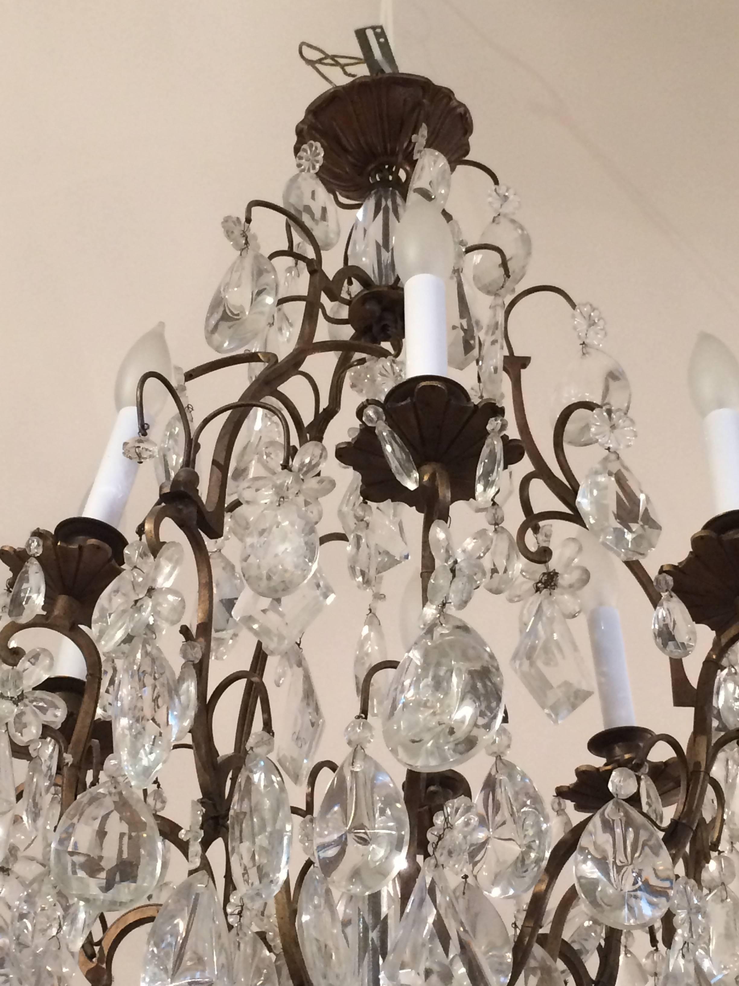 Rococo Matching Pair of Glitzy French Gilt Metal and Cut Glass Chandeliers For Sale