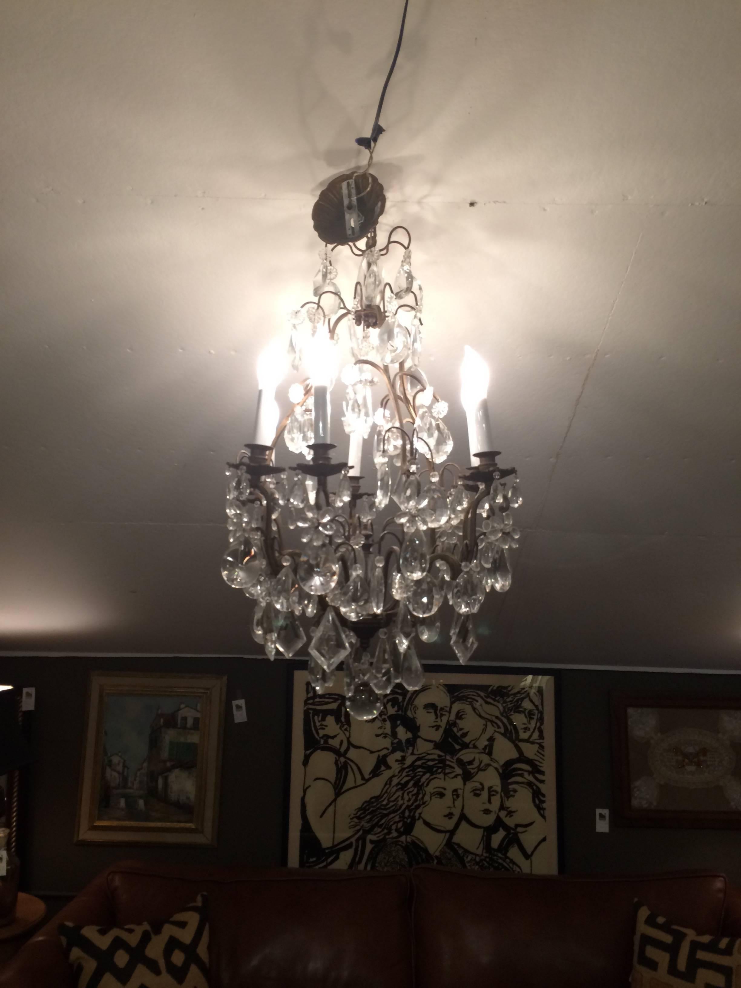 Matching Pair of Glitzy French Gilt Metal and Cut Glass Chandeliers For Sale 1