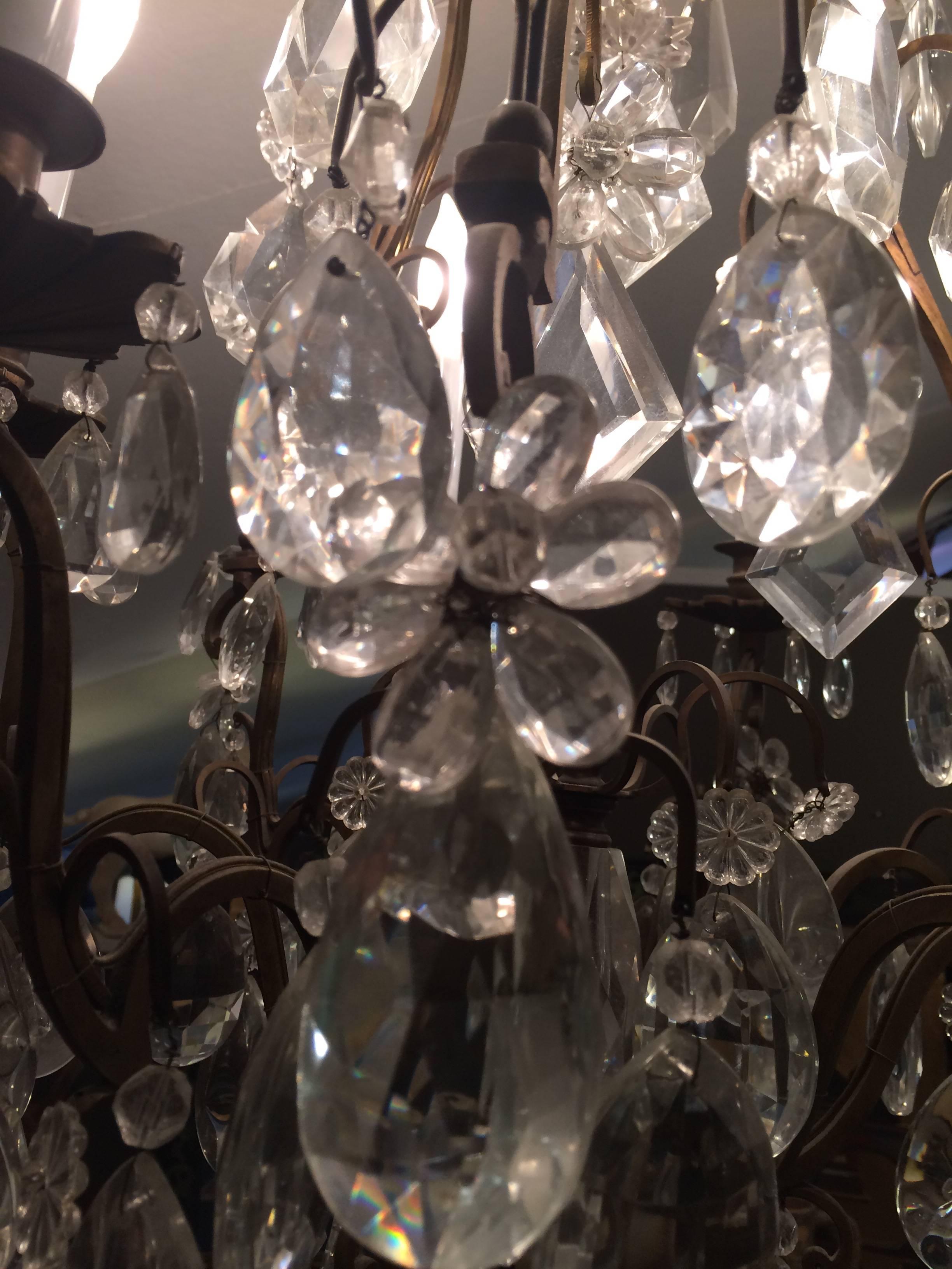 Matching Pair of Glitzy French Gilt Metal and Cut Glass Chandeliers For Sale 3