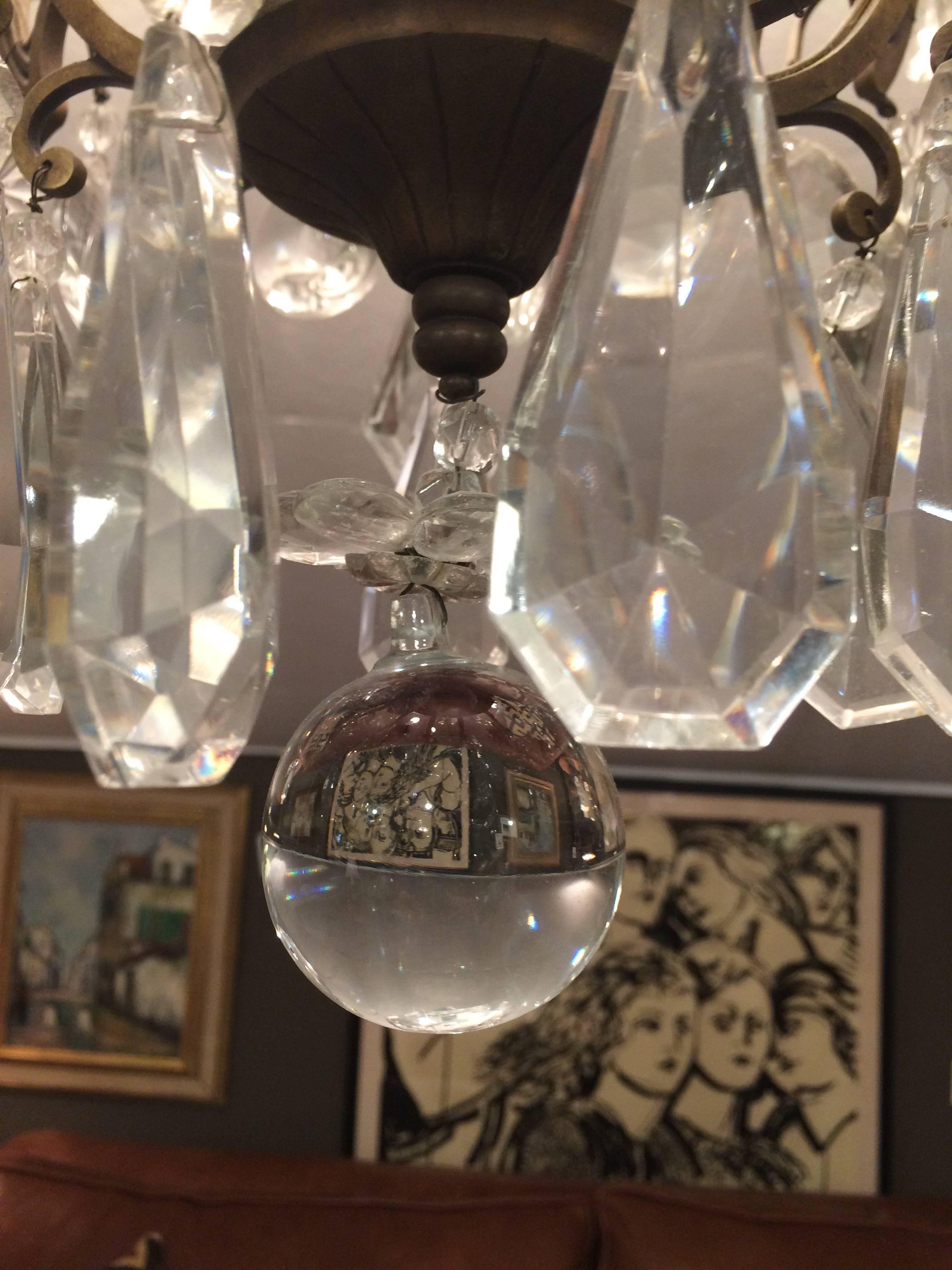 Matching Pair of Glitzy French Gilt Metal and Cut Glass Chandeliers For Sale 4