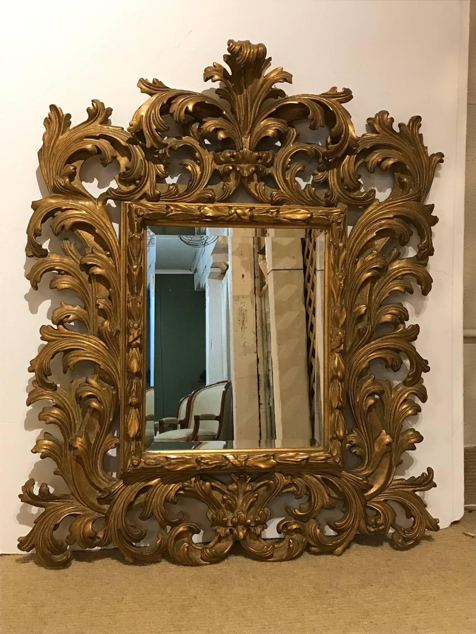Ornate Venetian Style Carved Giltwood Mirror In Excellent Condition In Hopewell, NJ