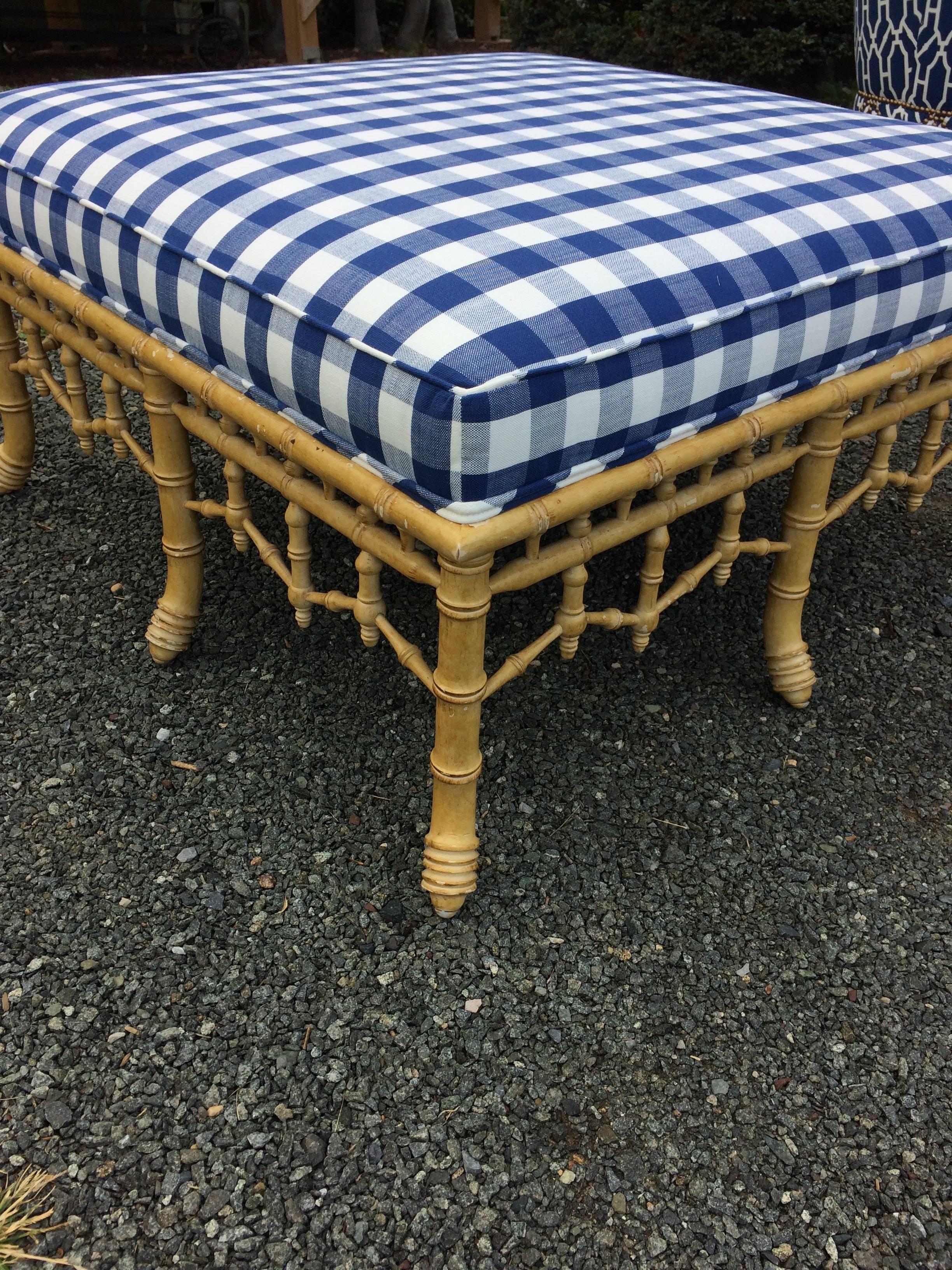 Stylish very large square ottoman having a wonderful faux bamboo base, newly upholstered in a zippy blue and white Gingham fabric.