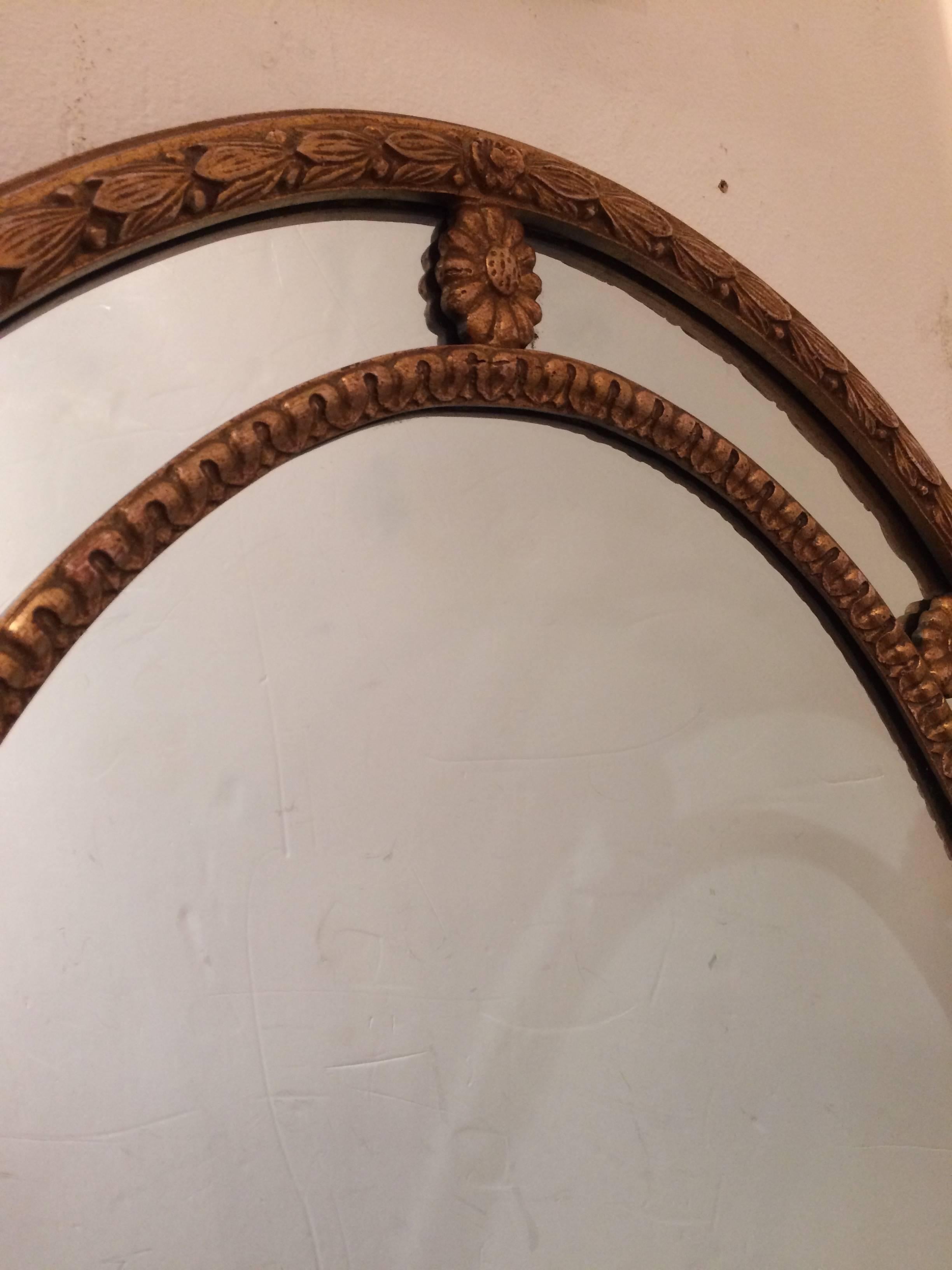 Mid-20th Century Classic Pair of Large Oval Italian Giltwood Mirrors