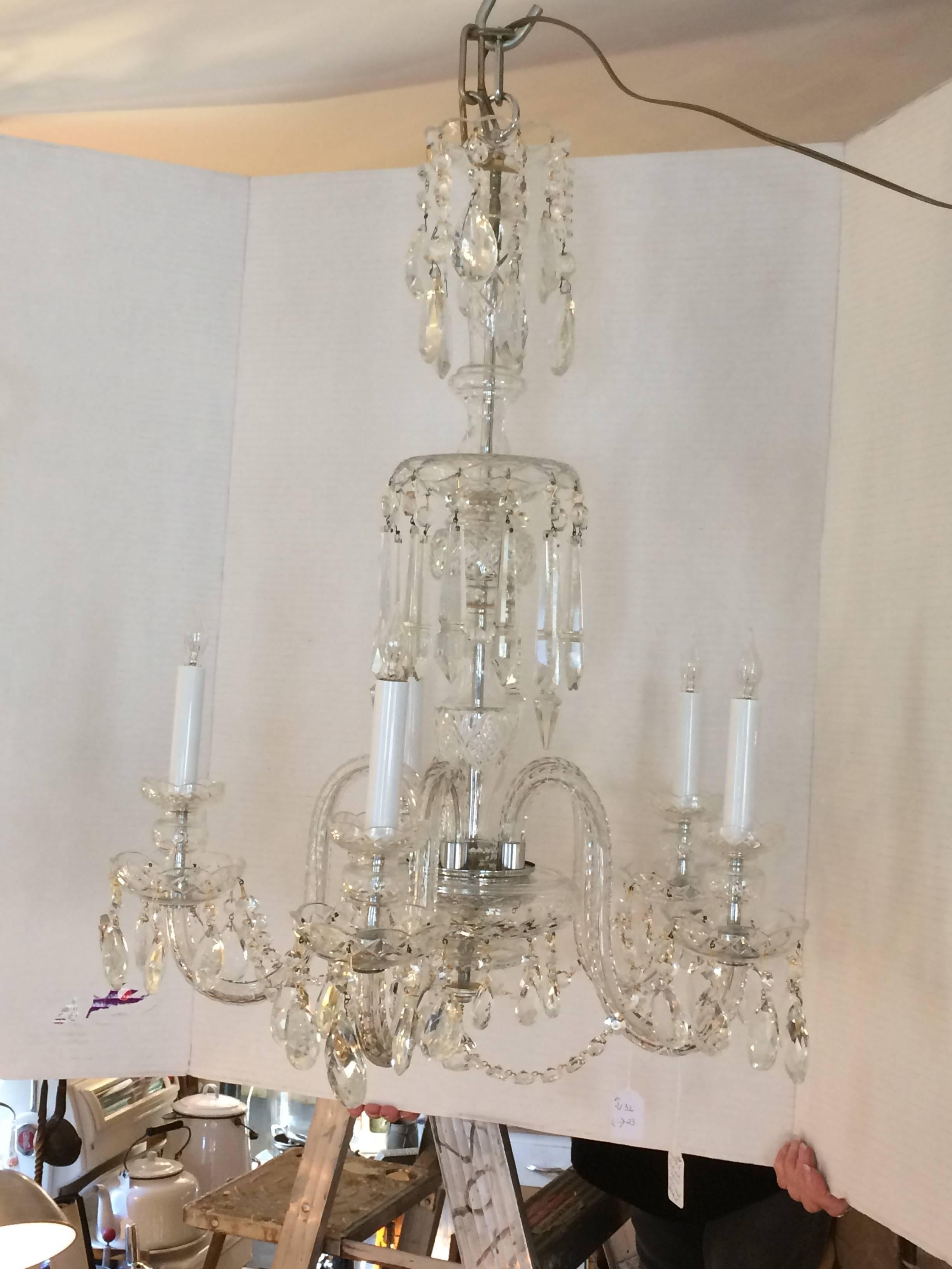 Gorgeous classic French crystal chandelier, perfect size for a medium sized dining room, having five cut crystal arms, 40 watt per arm, oodles of bling. Rewired and ready to hang.