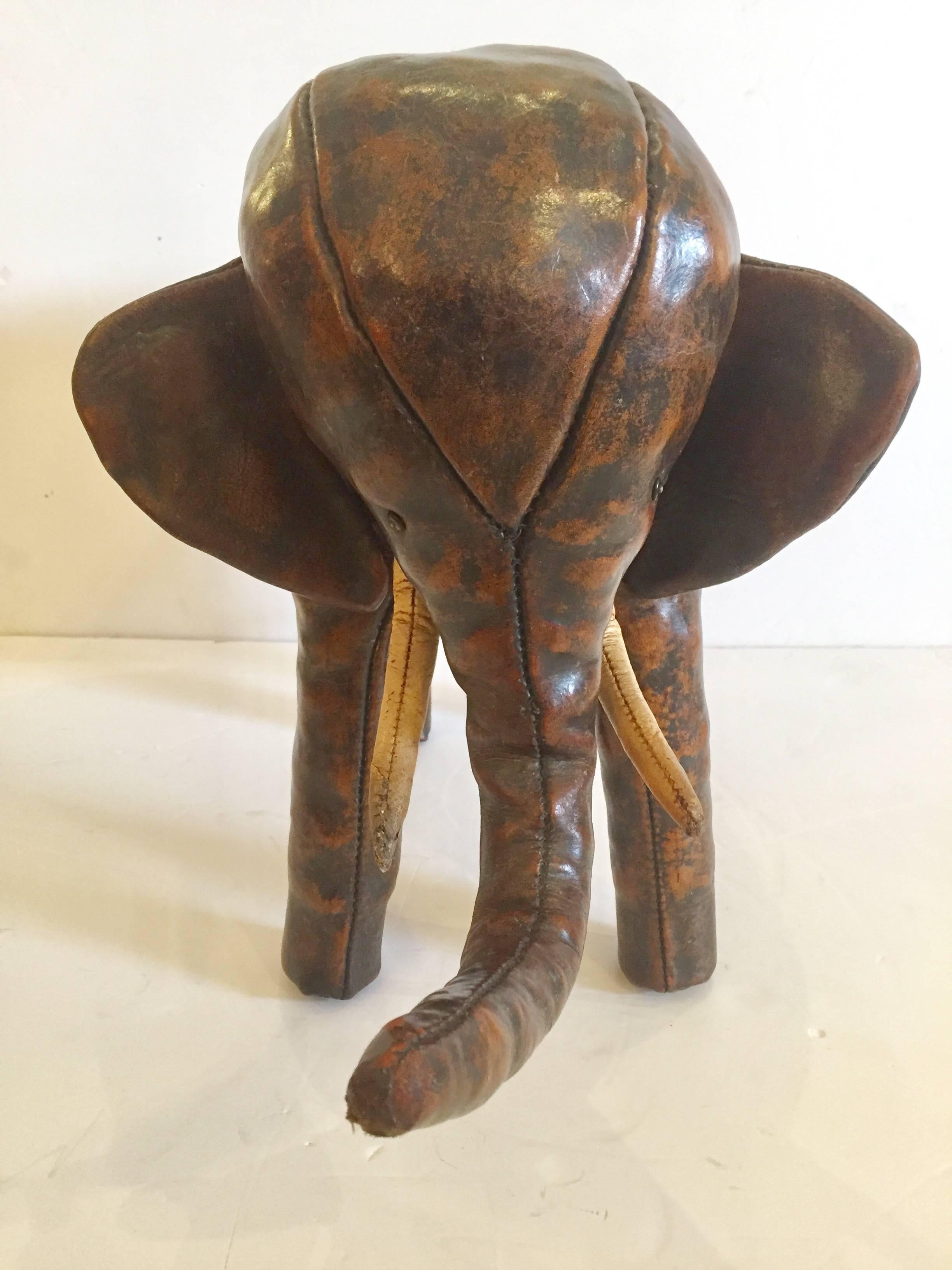 Fabulous vintage leather elephant foot stool by Dimitri Omersa for Abercrombie and Fitch. Incredible patina and condition.
   
