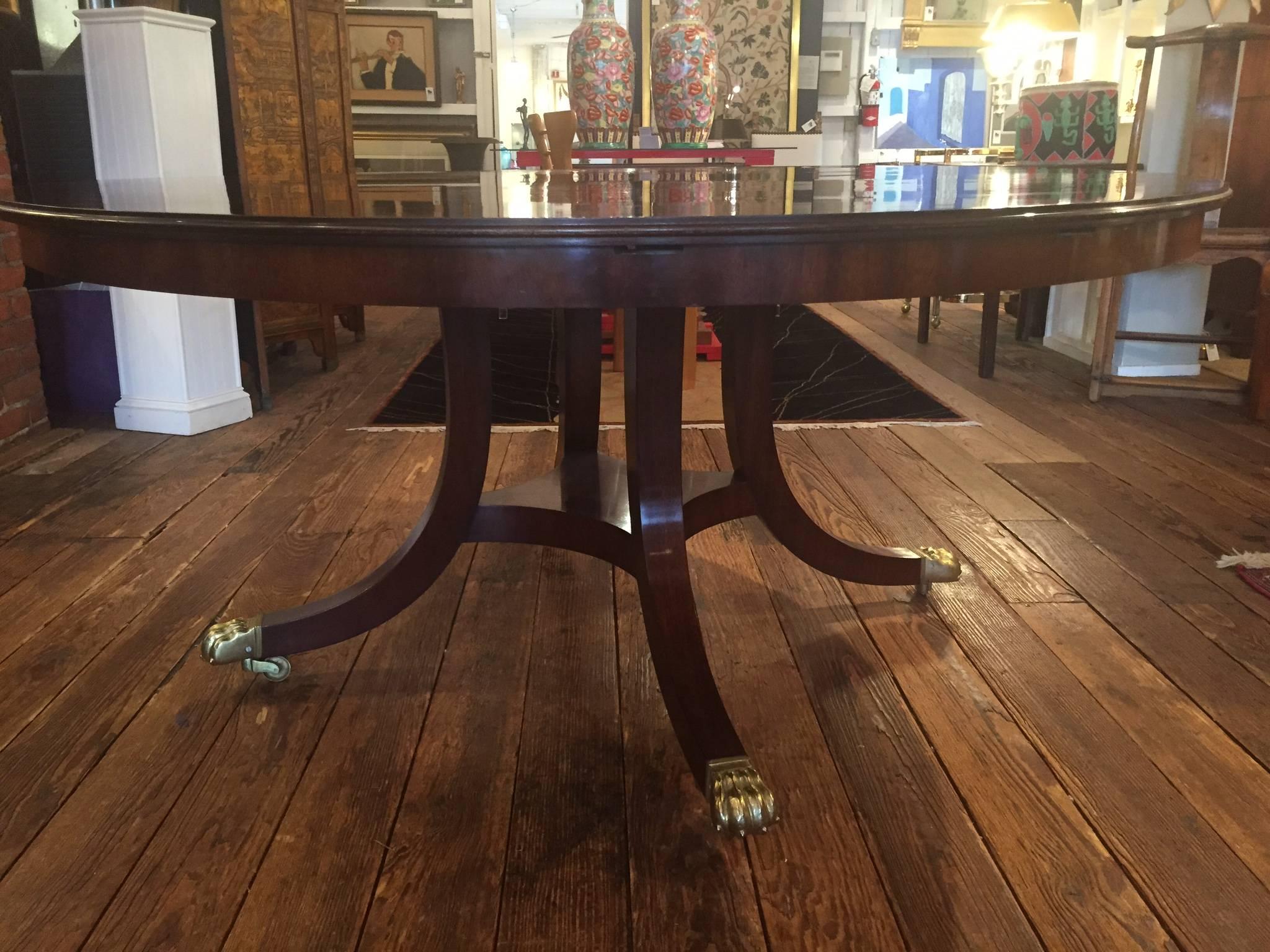 English Regal Enormous Round Mahogany Dining Table with Peripheral Leaves