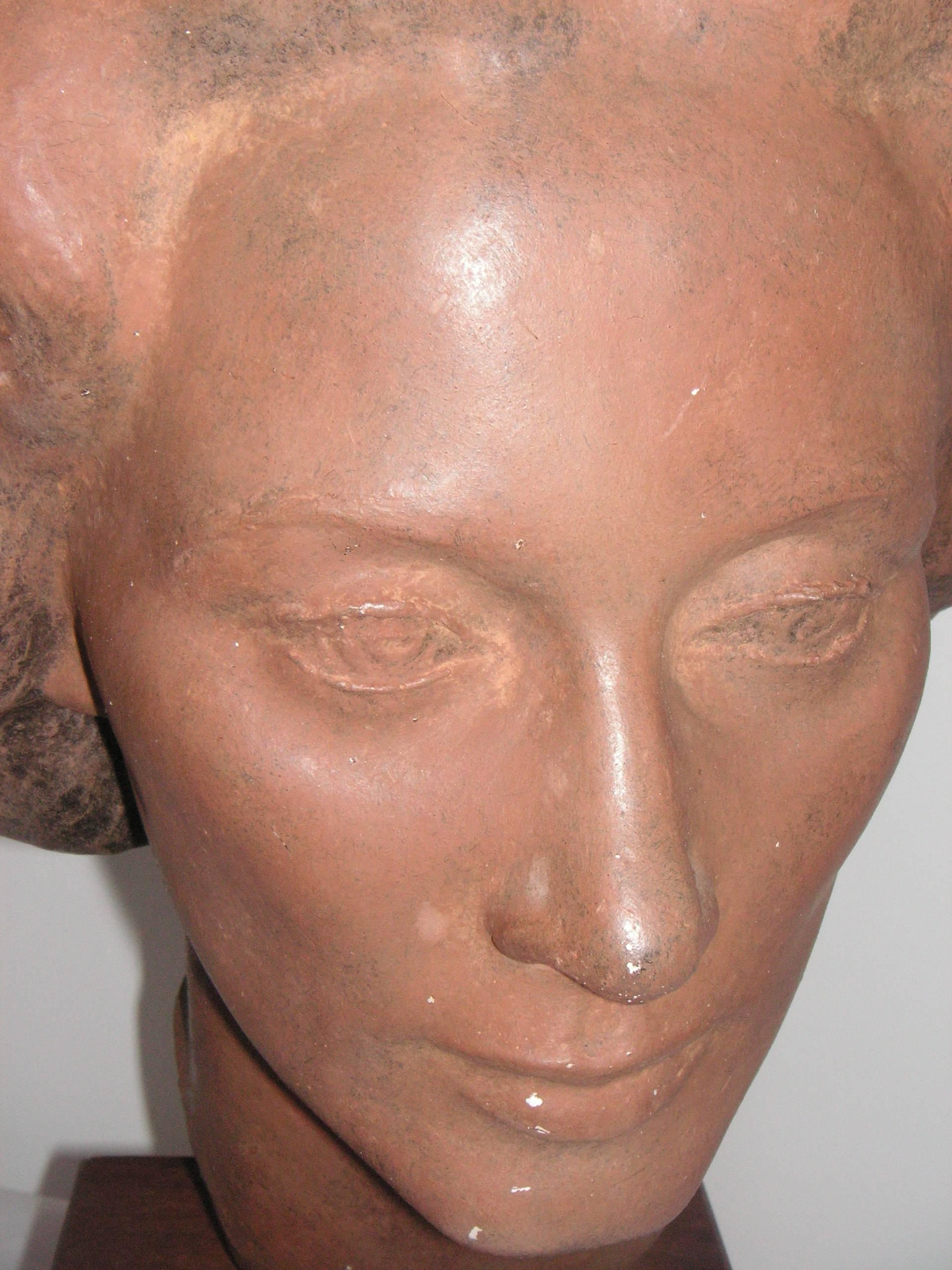 Plaster bust of a beautiful woman, with a patinated brown surface and walnut base, signed on back by famous sculptor Harry Rosin: H. Rosin 1955. 

Harry Rosin (1897–1973) was a well know New Hope, PA sculptor, especially famous for his statue of