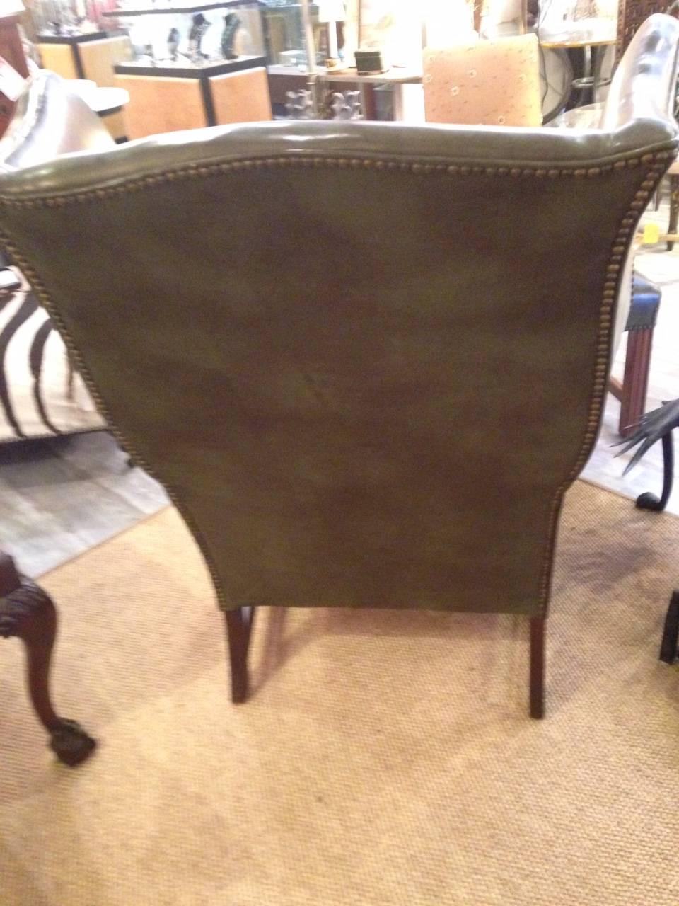 Mid-20th Century Green Leather Chippendale Style Wing Chair and Ottoman