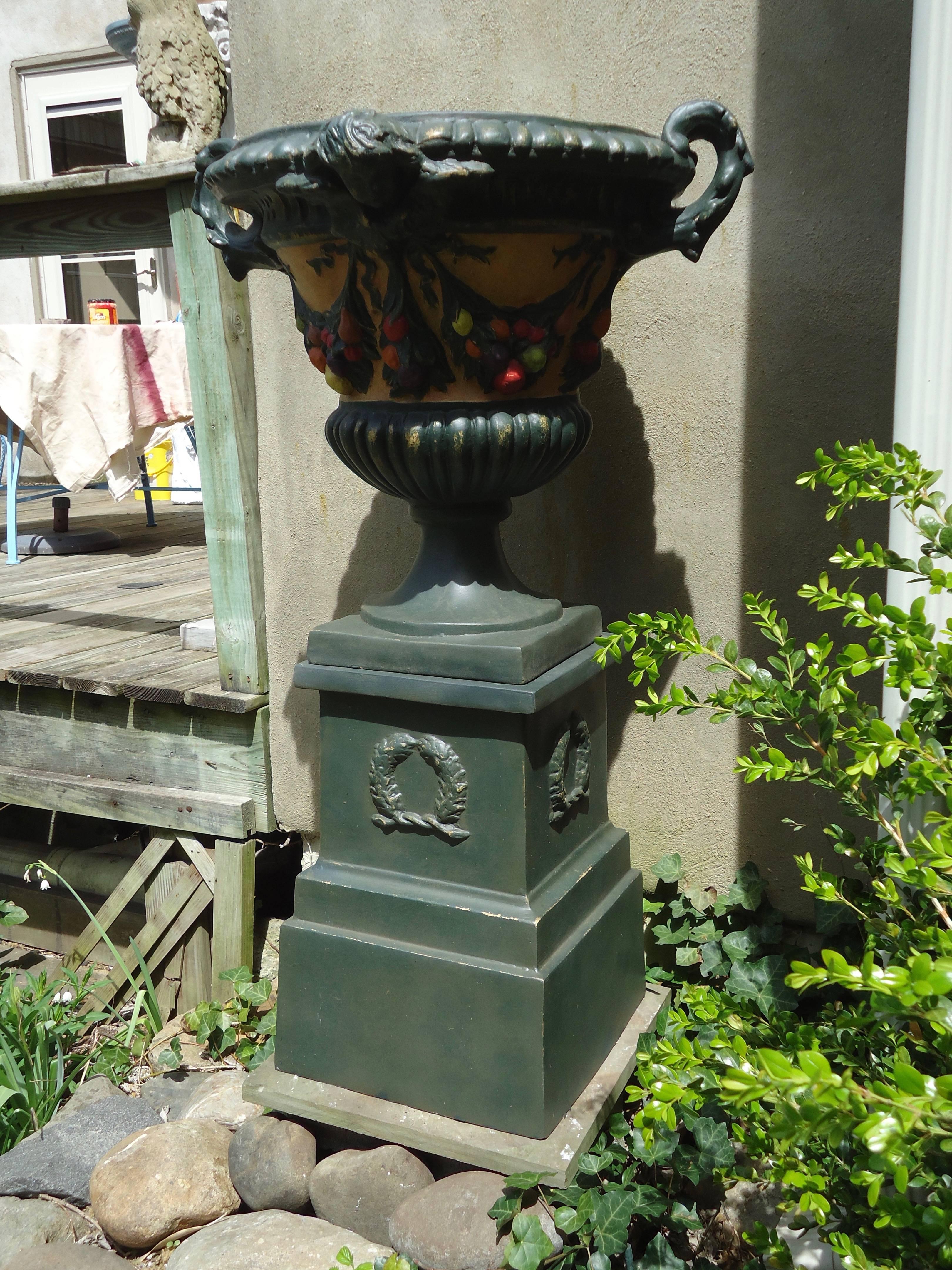 This fiberglass resin Italian style urn is hand cast from the original antique urn, having intricate details and a hand-painted aged faux finish. This high quality medium is impervious to weather, durable and maintenance free. It’s also very light