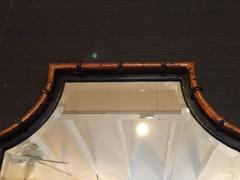 Pair of Smashing Faux Bamboo Gilt Metal and Ebonized Wood Mirrors