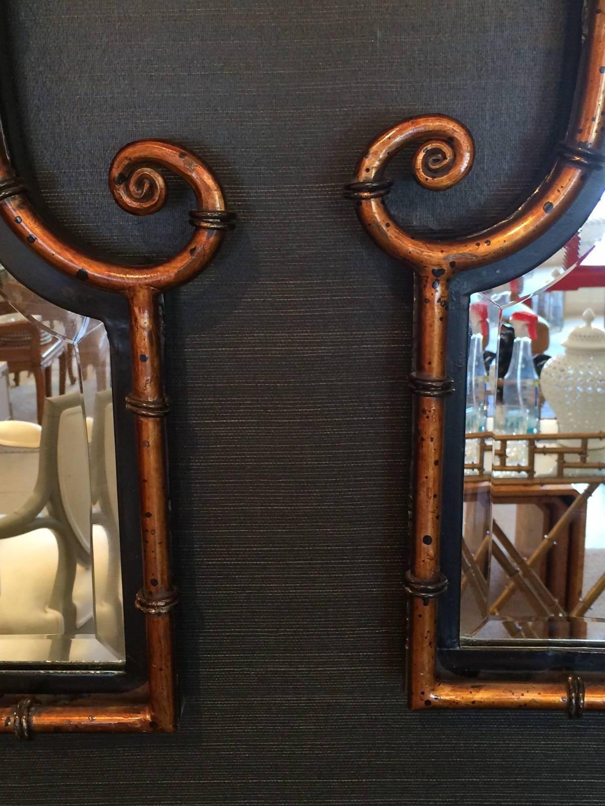 Mid-Century Modern Pair of Smashing Faux Bamboo Gilt Metal and Ebonized Wood Mirrors