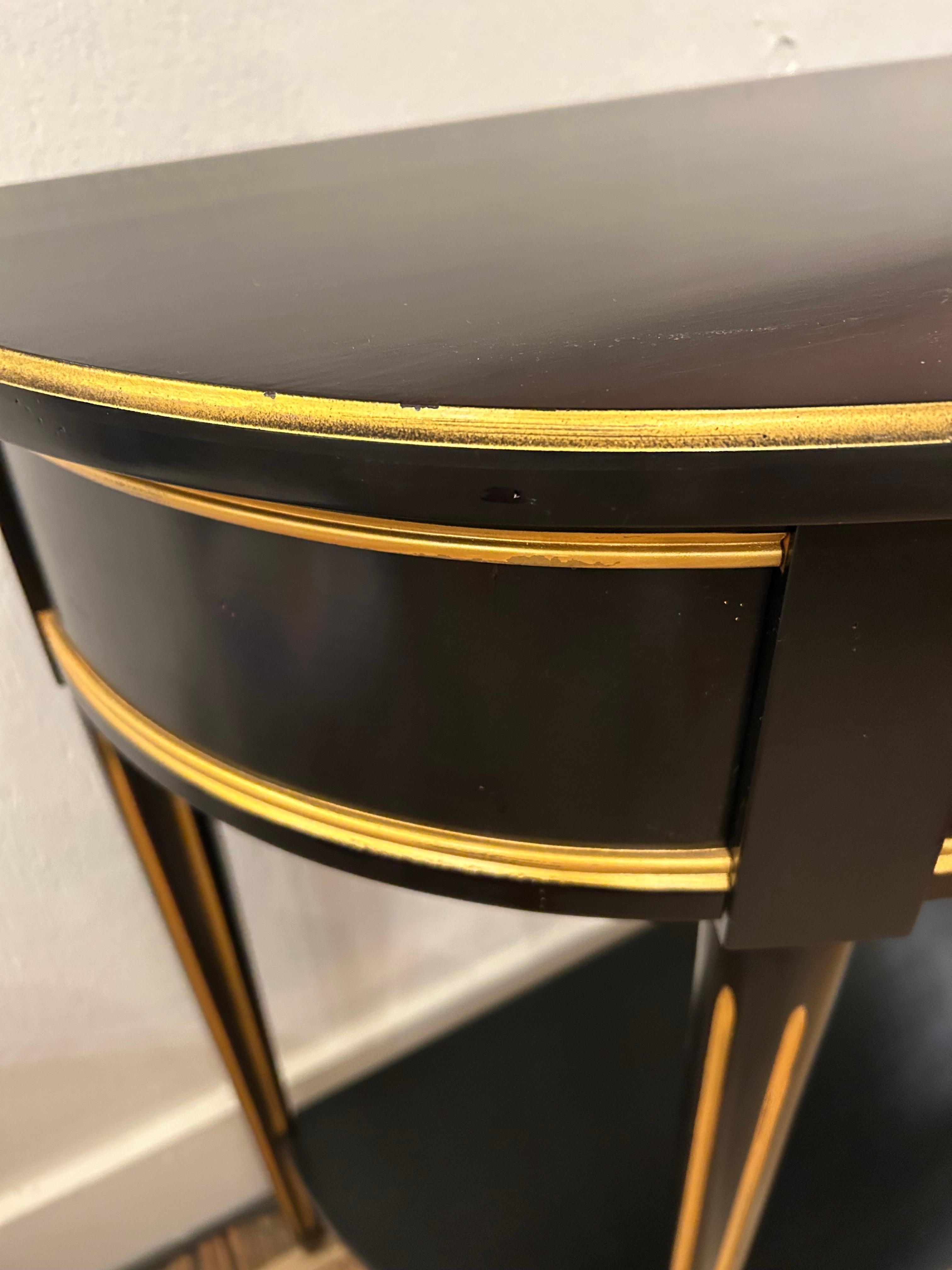 Ebonized Hollywood Regency Black & Gold Demilune Console Table by Grange For Sale