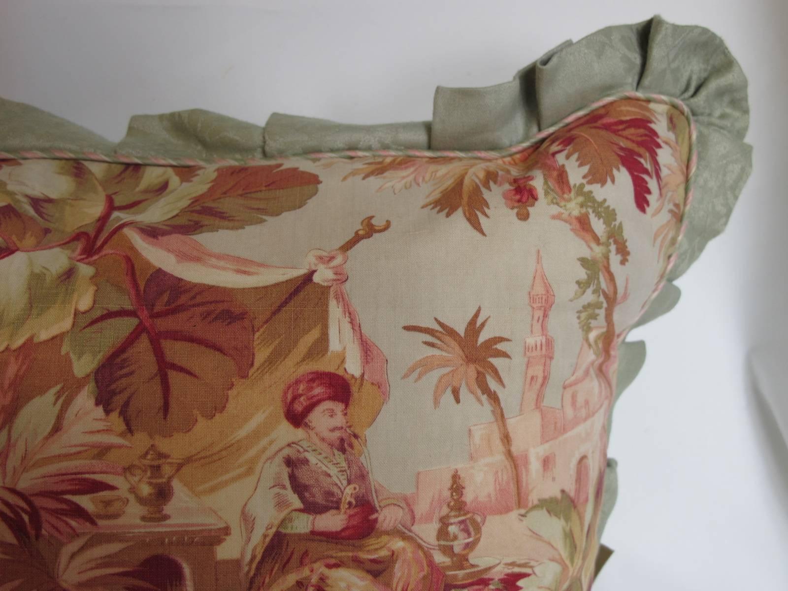 A pillow made from a circa 1880s scenic printed cotton, in muted shades of pink and sage, edged and backed with hand dyed linen damask, with a bow back closure, includes a down insert.
Excellent condition, two available.
 
