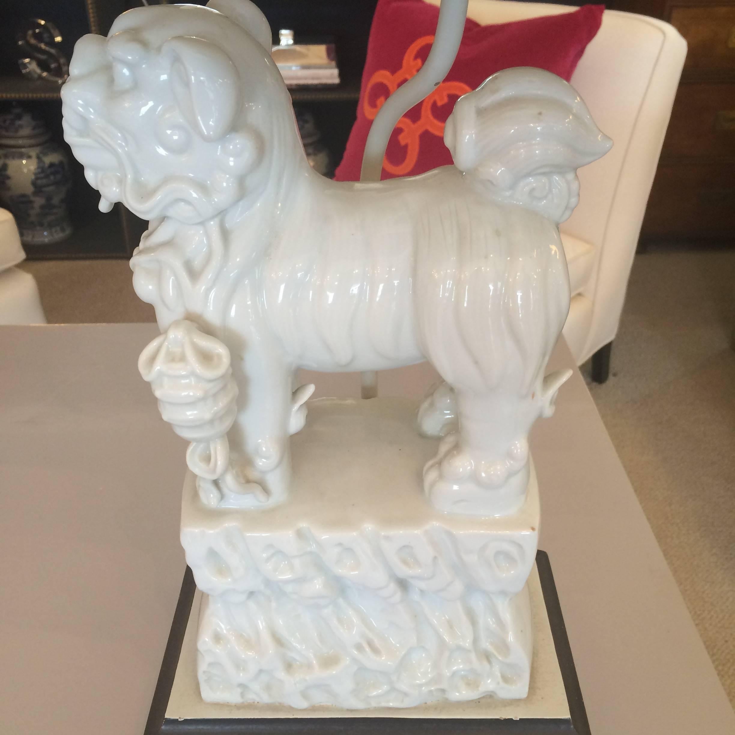 Chinese Pair of Blanc de Chine Foo Dog Lamps