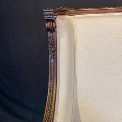 French Louis XVI Bergère à la Reine Chair with Exceptional Carving