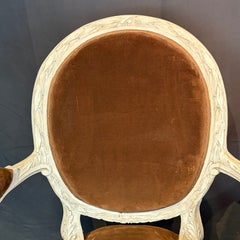 Pair of 19th Century French Louis XVI Carved and Painted Armchairs