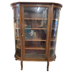 Antique Empire Bow Front Oak and Curved Glass Curio Cabinet Vitrine
