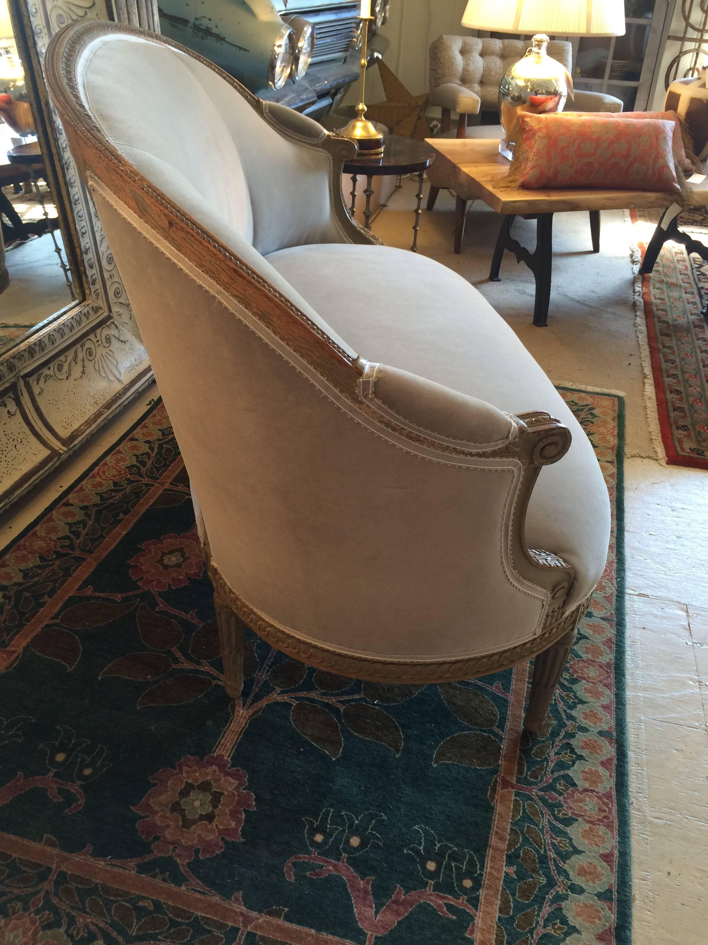 Elegant 1940s carved wood settee with a 