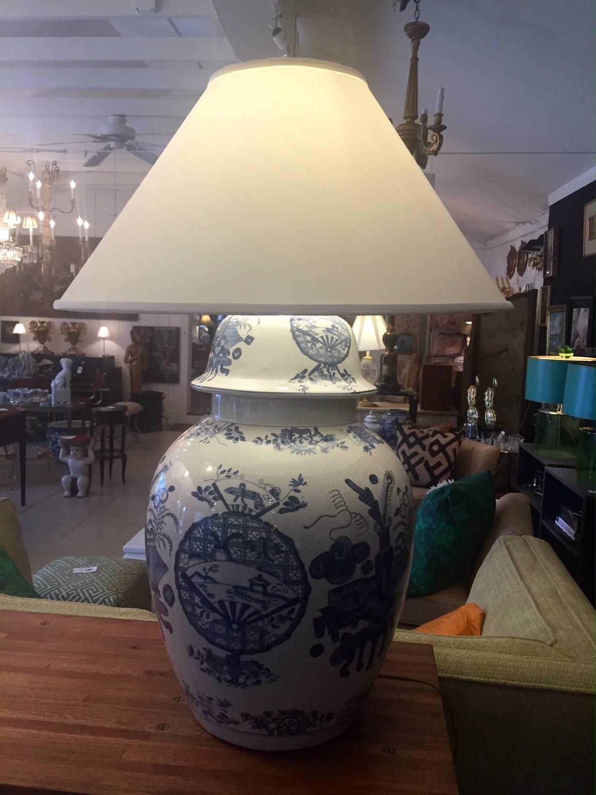 Impressively large pair of Chinese ginger jar lamps in Classic blue and white pattern. Custom shades 24